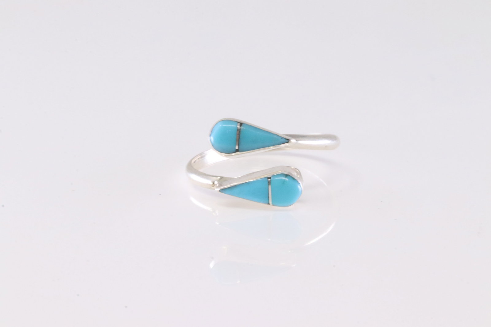 Native America Zuni Sterling Silver Turquoise Inlay Ring By R.V.N.: This is a Native America Zuni Sterling Silver Turquoise Inlay Ring By R.V.N. Ring size: 6.50.