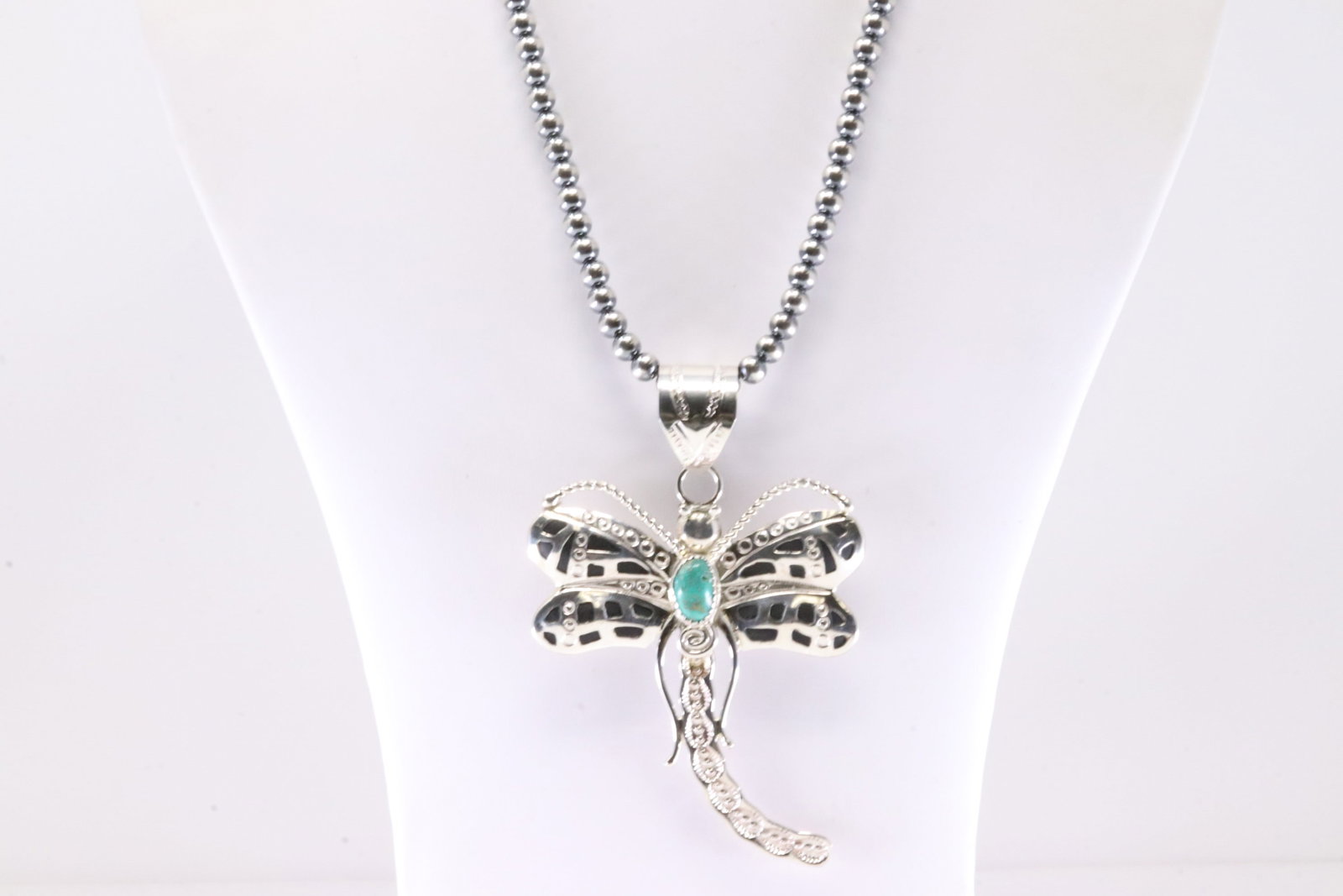 Native America Navajo Sterling Silver Turquoise Dragonfly Pendant By Alonzo Mariano. With Pearl: This is a Native America Navajo Sterling Silver Turquoise Dragonfly Pendant By Alonzo Mariano. With Pearl Beaded Sterling Silver Machine Made Necklace. Necklace length: 18.00"