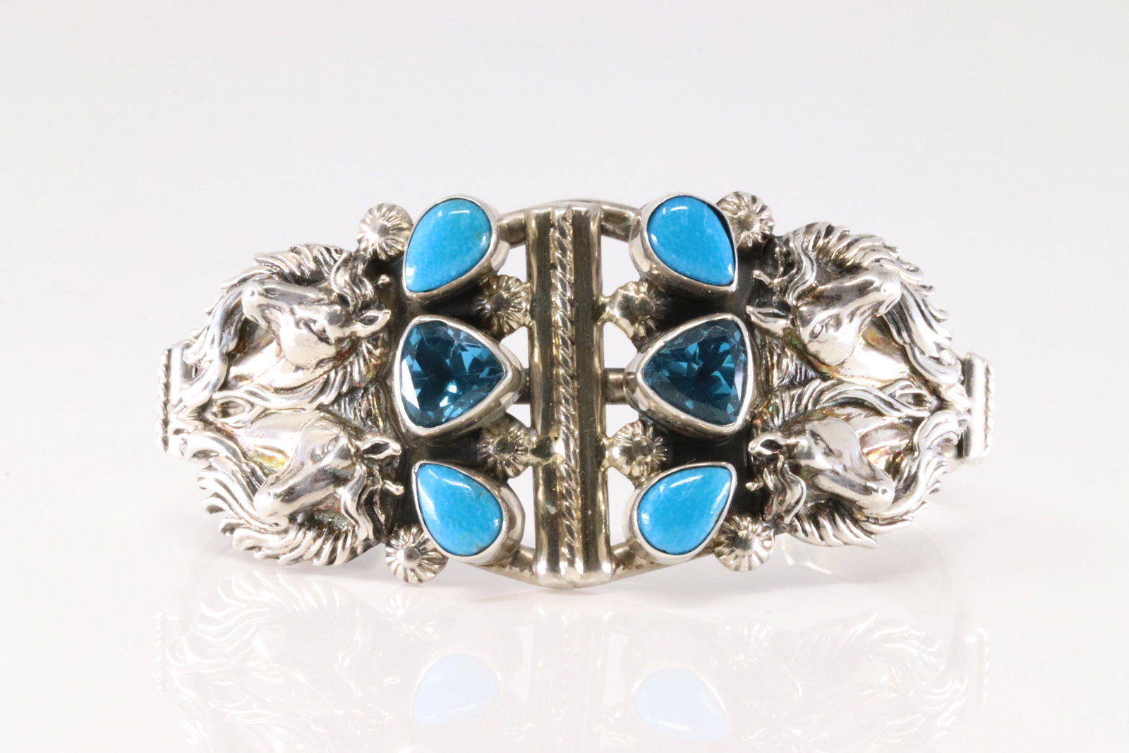 Native America Navajo Sterling Silver Blue Topaz & Turquoise Bracelet Head Horse Cuff. From R.B: This is a Native America Navajo Sterling Silver Blue Topaz & Turquoise Bracelet Head Horse Cuff. From R.B Company. Total Weight: 58.20 Grams.