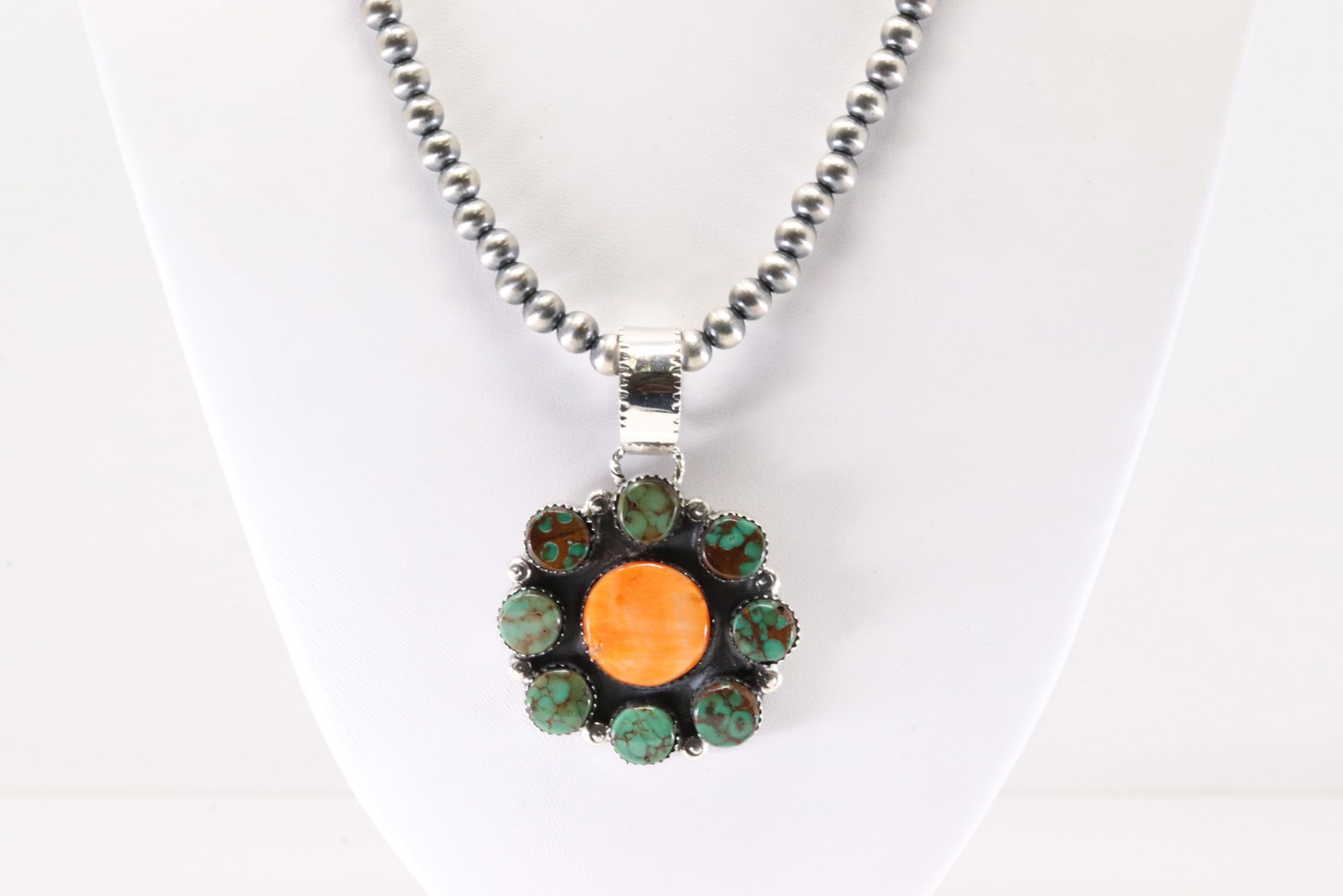 Native America Navajo Sterling Silver Spiny Oyster & Turquoise Pendant By Selena Warner. With: This is a Native America Navajo Sterling Silver Spiny Oyster & Turquoise Pendant By Selena Warner. With Machine Made Stearling Silver Pearl Beaded Necklace. Stamp SW. Necklace Length: 18.00.