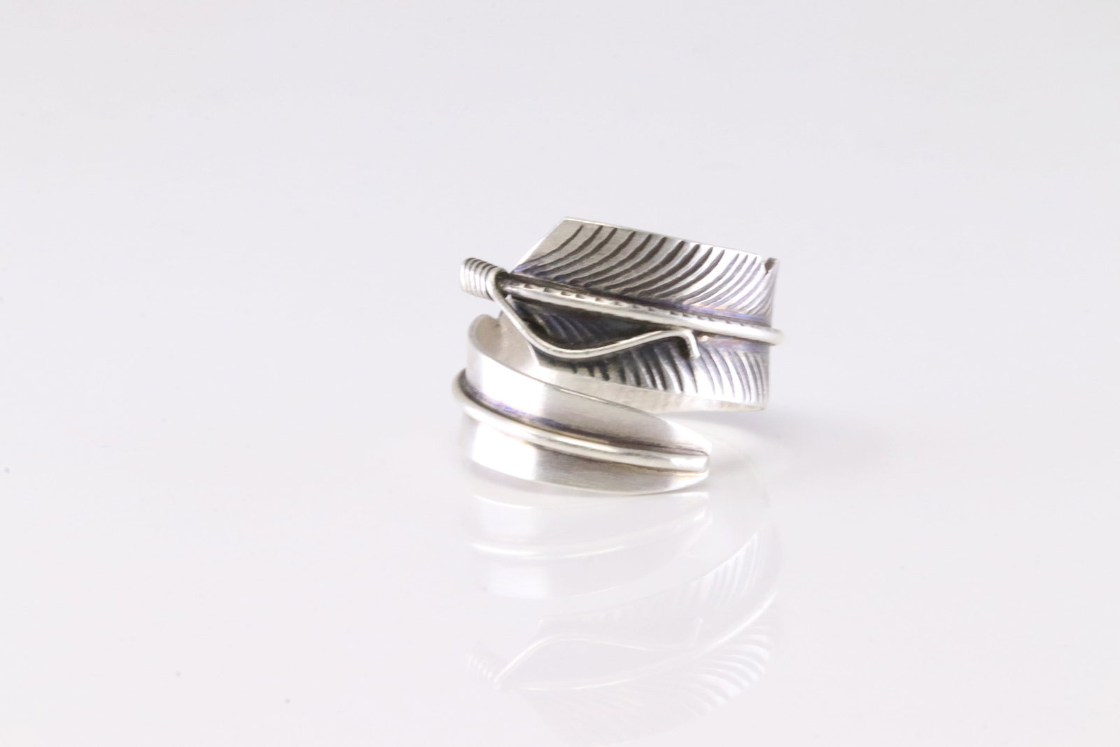 Native America Navajo Sterling Silver Solid Stamped Feather Ring By CC.: This is a Native America Navajo Sterling Silver Solid Stamped Feather Ring By CC. Stamp CC. Ring Size: 8.50.
