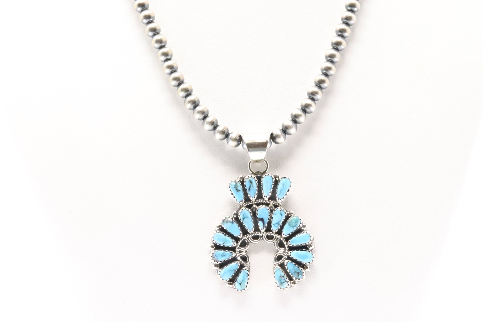 Native America Navajo Sterling Silver Turquoise Pendant By Zeita Begay With Machine Made Stearling: This is a Native America Navajo Sterling Silver Turquoise Pendant By Zeita Begay With Machine Made Stearling Silver Pearl Beaded Necklace. Stamp ZB. Necklace Length: 16.00".