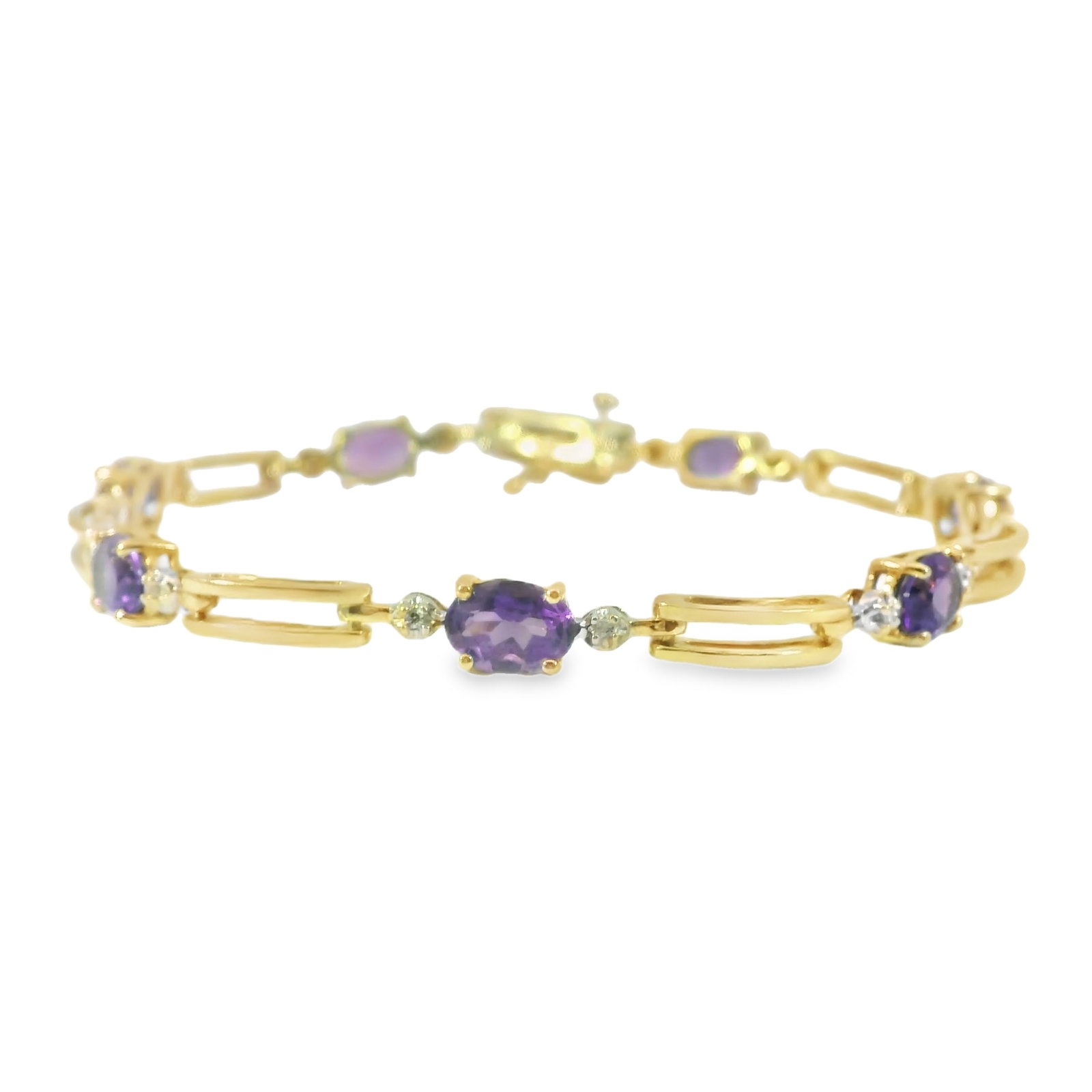 Amethyst & Diamond Bracelet 10Kt. This elegant bracelet features stunning amethyst gemstones set in: Amethyst & Diamond Bracelet 10Kt. This elegant bracelet features stunning amethyst gemstones set in a delicate gold chain. The vibrant purple stones are beautifully complemented by 14 Sparklin