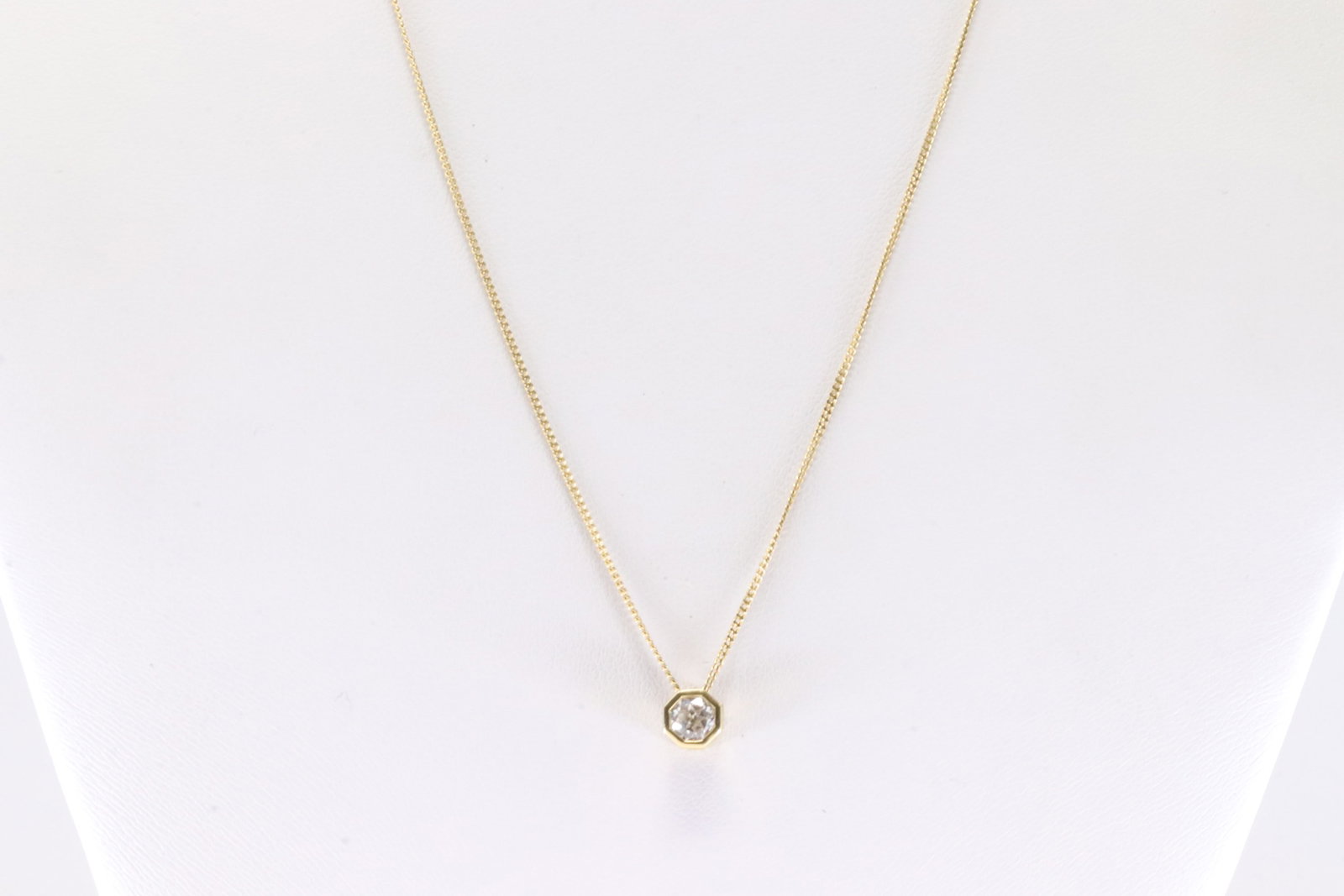 Diamond Pendant / Necklace 18Kt.: 18Kt Yellow Gold Diamond Pendant / Necklace. This Charm has Solitaire Brilliant Diamond with A 18K Necklace. Necklace length: 20.00" Total weight: 2.38 Grams.