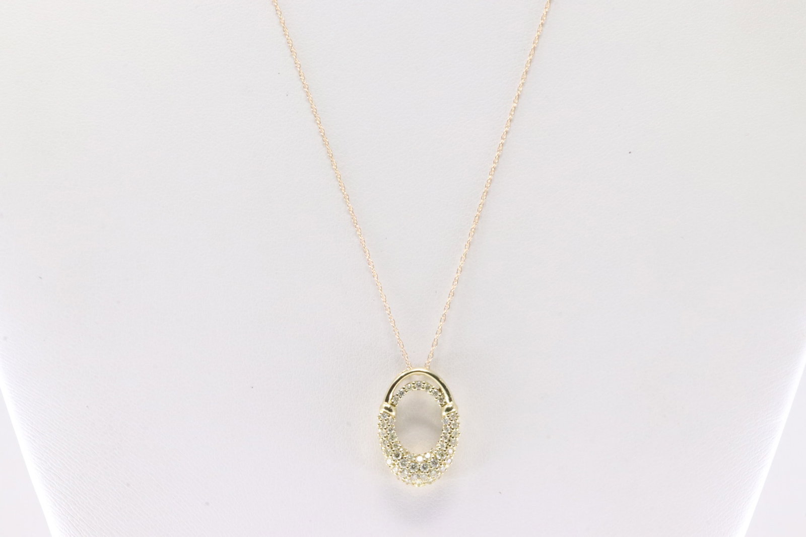 Diamond Pendant / Necklace 10Kt.: Ladies 10Kt Yellow Gold Diamond Pendant / Necklace. This Necklace has A Pendant With 50 Round Sparkling Diamonds. Diamond Approx Weight: 0.50 ctw. Necklace Length: 18.00.