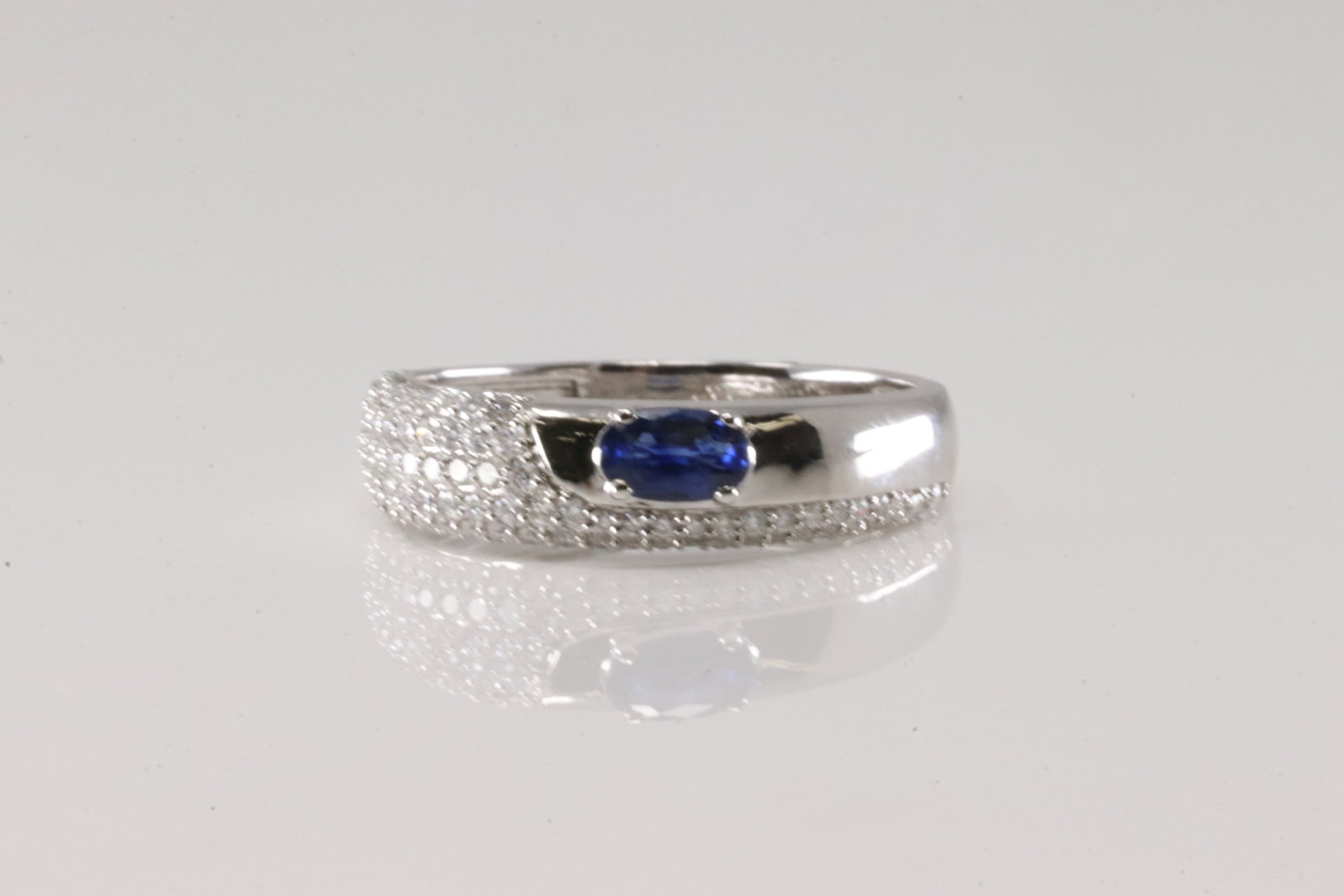 Sapphire & Diamond Ring 14Kt.: 14Kt White Gold Sapphire & Diamond Ring. This Elegant Ring has Blue Sapphire with Sparkling Diamonds. Diamonds weight: 0.46ctw. Sapphire weight: 0.26ct. Ring size: 6.50. Total weight: 2.60 Grams.