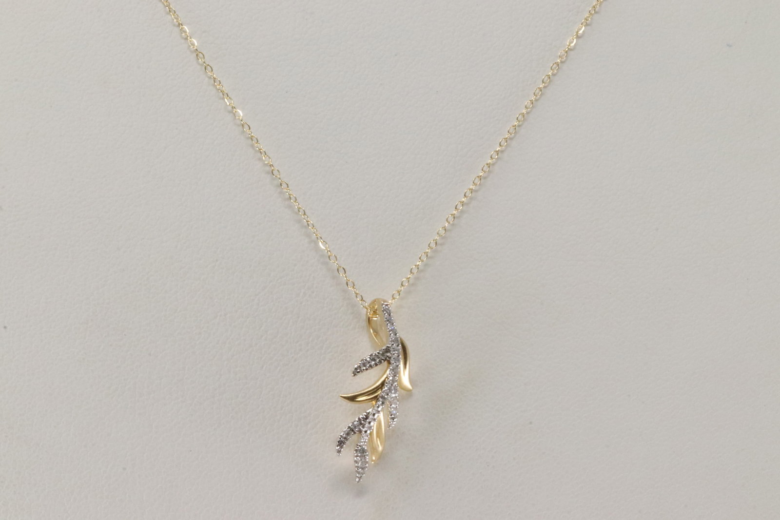Diamond Pendant / Necklace 14Kt.: 14Kt Yellow Gold Diamond Pendant / Necklace. This Elegant Charm has 21 round Diamonds with A Necklace. Diamonds weight: 0.10ctw. Necklace length: 18.00" Total weight: