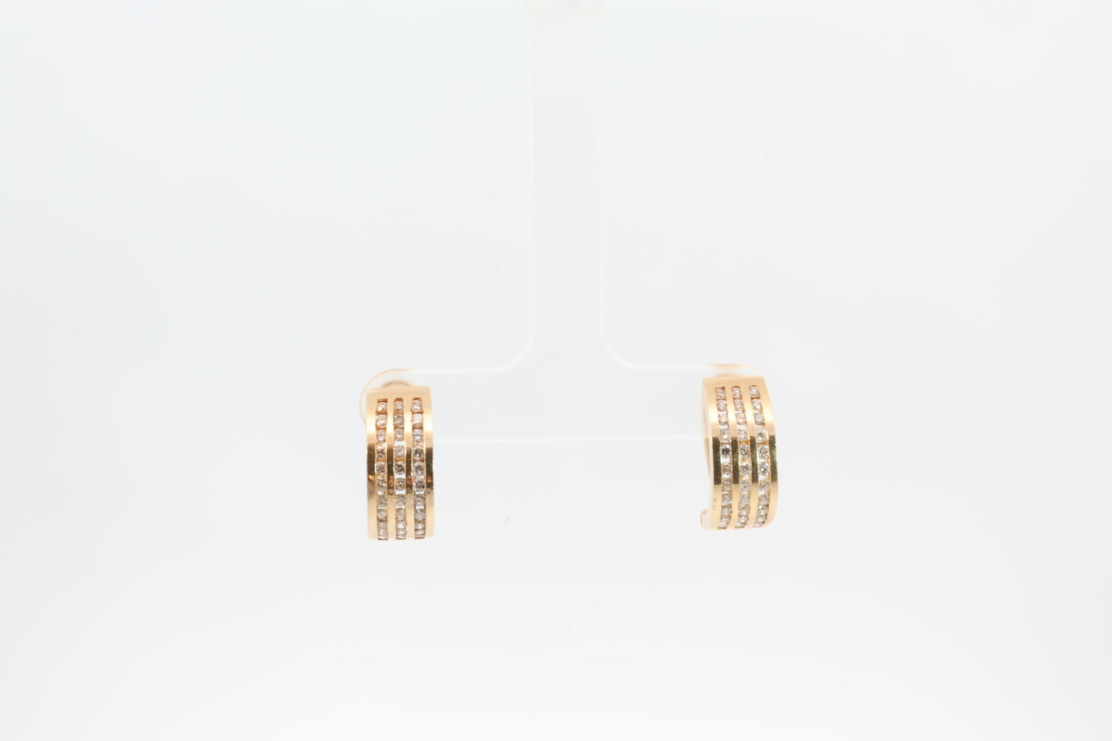 Diamond Hoop Earring French Clip 14Kt.: Ladies 14Kt Yellow Gold Diamond Hoop Earring French Clip. Earring's has 3 Line to each with 66 round Diamonds. Diamonds weight approx: 1.20 ctw 6.30 Grams.