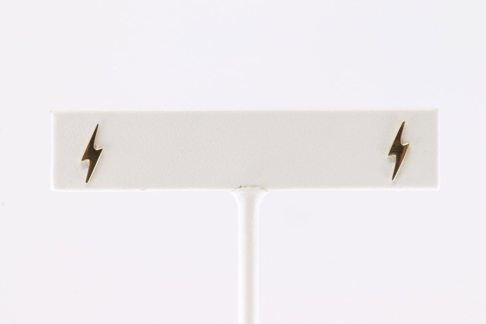 Lightning Stud Earring 14Kt.: Ladies 14Kt Yellow Gold Lightning Stud earring. This Charming Earring Stud Earring has Lightning Design.