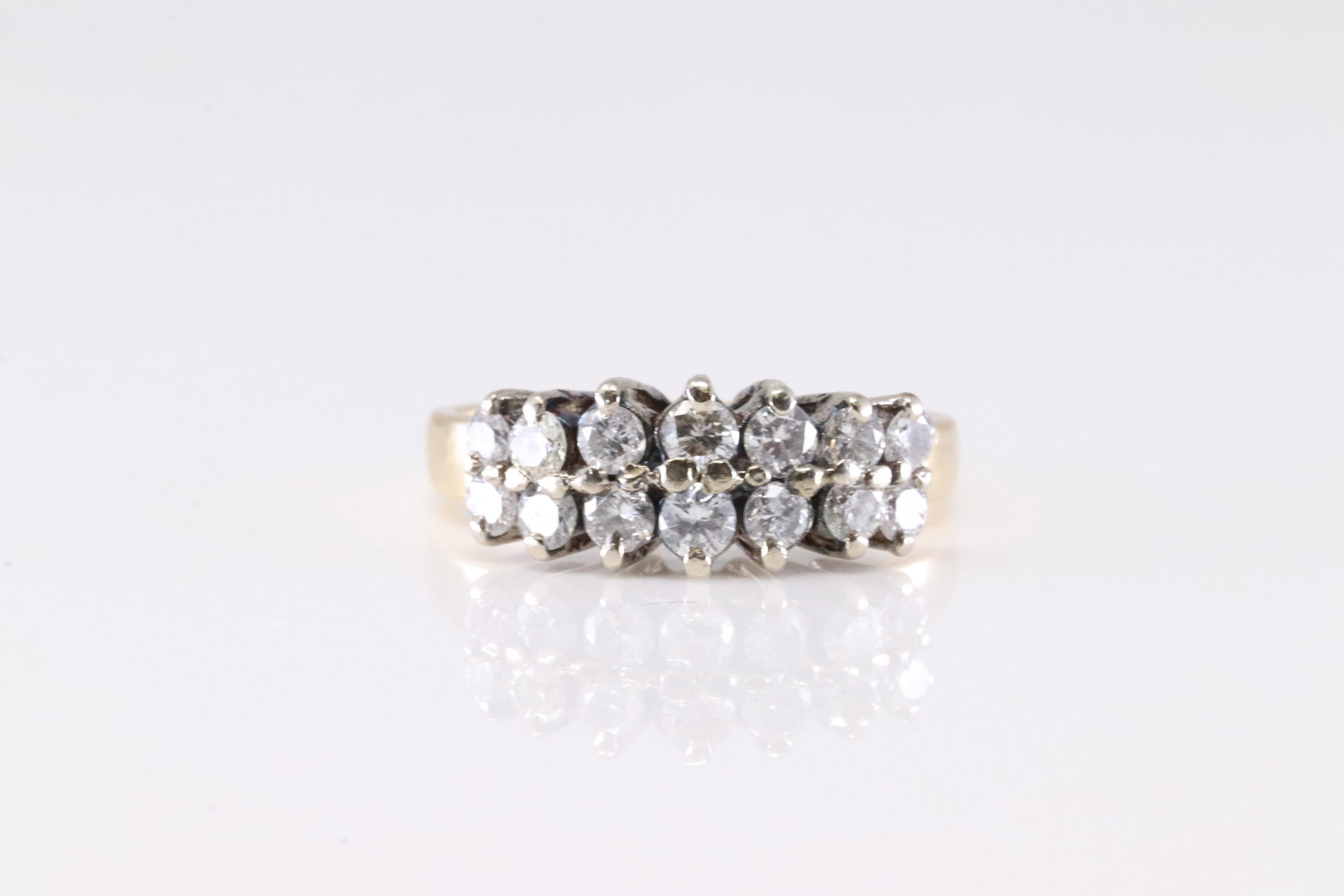 Elegant Diamond Ring 14Kt.: Ladies 14Kt Yellow Gold Diamond Ring. This Elegant Ring has 14 Sparkling Diamonds. Diamonds weight approx: 1.00cttwRing size: 6.25. Total weight: 3.82 Grams.