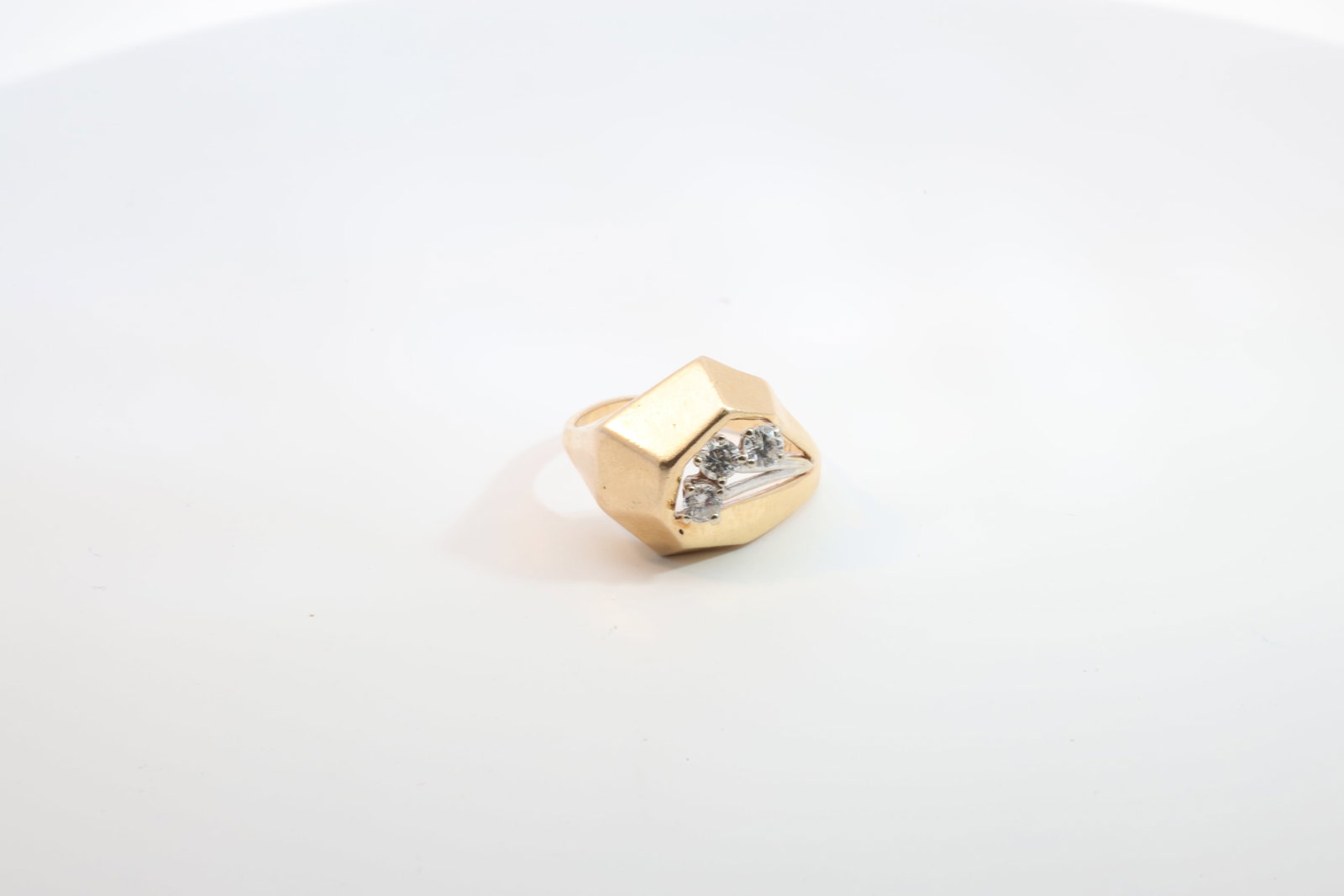 Diamond Ring 14Kt.: Ladies 14Kt Yellow Gold Diamond Ring. Ring has 2 tone with 3 round Diamonds. Diamonds weight approx: 0.25 ctw Ring size: 7.50. Total weight: 5.50 Grams.