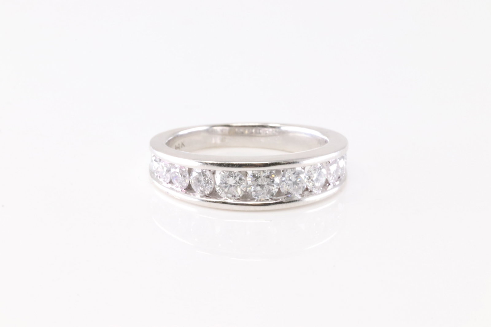 Diamond Ring 14Kt.: Ladies 14Kt White Gold Diamond Ring. This Charming Ring has 11 Round Sparkling Diamonds. Diamond Weight Approx: 1.25 ctw Ring Size: 7.50. Total Weight: 5.0 Grams.