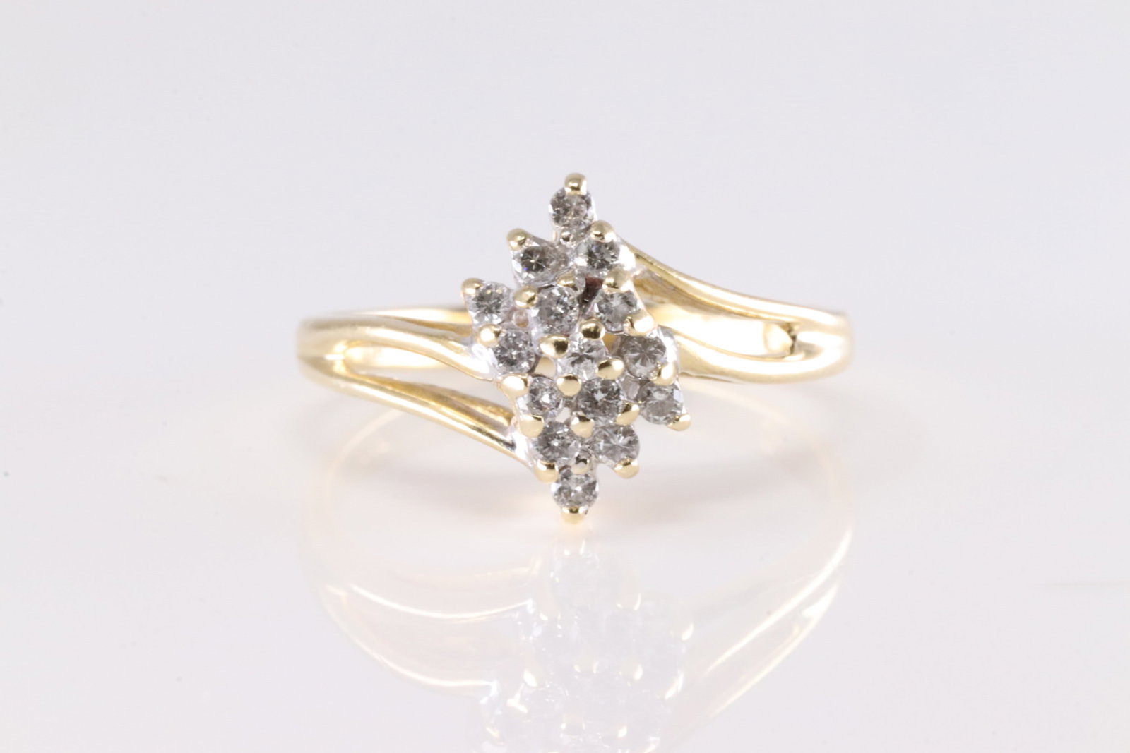 Diamond Ring 14Kt.: Ladies 14Kt Yellow Gold Diamond Ring. This Ring has 15 Round Sparkling Diamonds. Diamond Approx Weight: 0.50ctw. Ring Size: 6.50. Total Weight: 2.60grams.