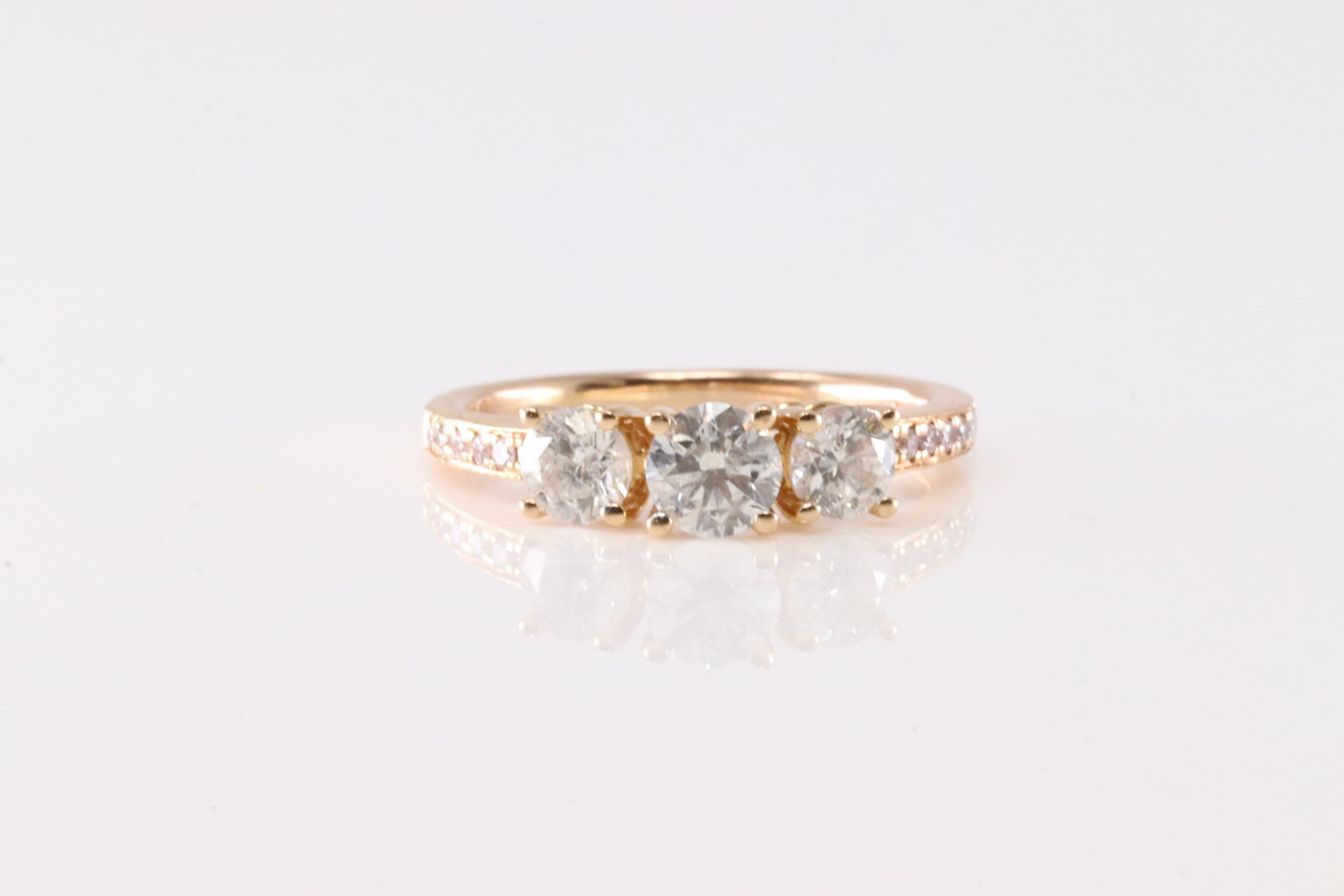 Diamond Ring 18Kt.: Ladies 18Kt Rose Gold Diamond Ring. This Elegant Ring has 15 Round Sparkling Diamonds. Diamond Weight Approx: 0.40 ctw Ring Size: 5.50.