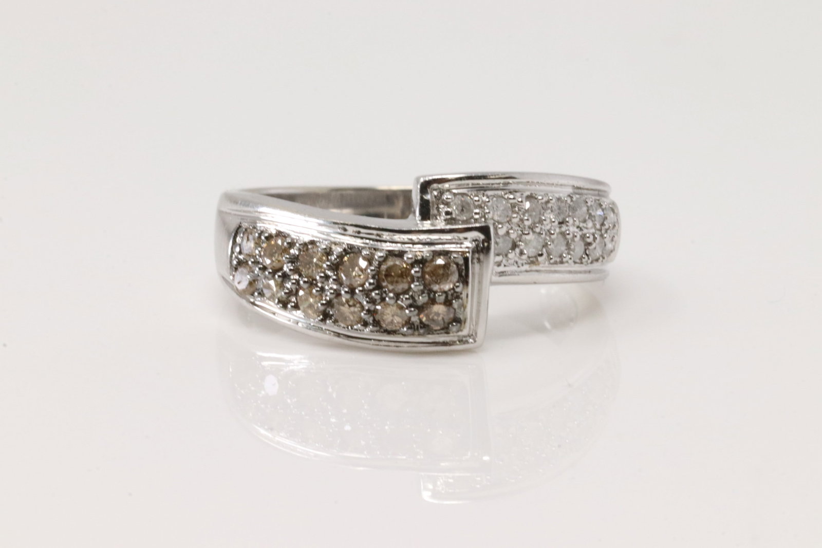 Wedding Champagne Diamond Ring 10Kt.: 10Kt White Gold Wedding Champagne Diamond Ring. This elegant ring has 24 round Champagne and white diamonds. Diamonds weight approx: 0.55ctw. Ring size: 8.25. Total weight: 3.40 Grams.