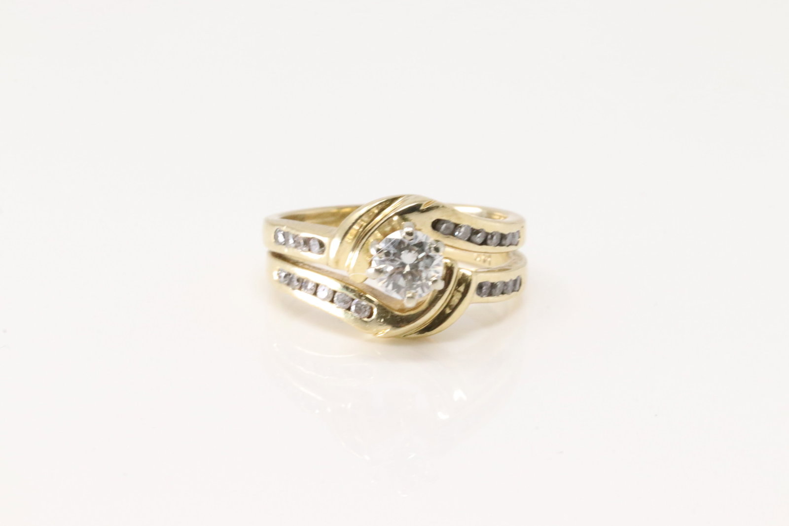 Elegant Diamond Double Ring 14Kt.: Ladies 14Kt Yellow Gold Diamond Double Ring. This elegant double band ring has 21 round brlliants diamonds. Diamonds weight approx: 0.87ctw. Ring size: 7.00. Total weight: 6.70 Grams.