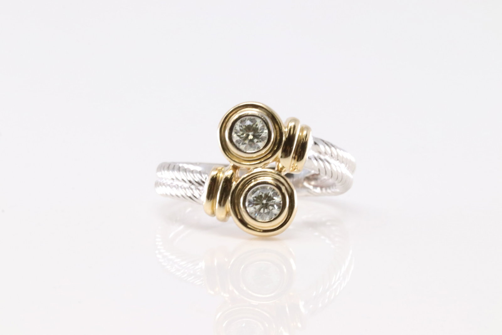 Diamond Ring 14Kt.: Ladies 14Kt Yellow Gold Diamond Ring. This Charming Ring has White & Yellow Gold With 2 Sparkling Diamonds. Diamonds Approx Weight: 0.50ctw. Ring Size: 7.00. Total Weight: 4.60grams.