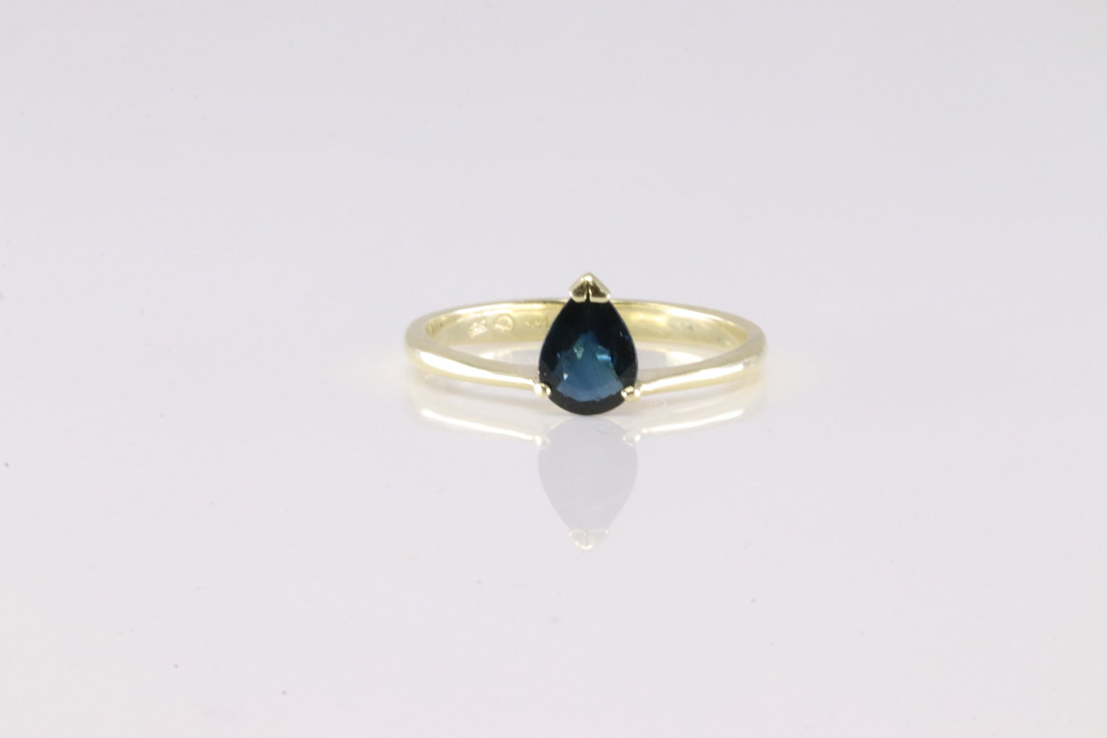 Sapphire Ring 14Kt.: Ladies 14Kt Yellow Gold Sapphire Ring. This Elegant Ring has Pear Design Sapphire Gemstone. Ring Size: 8.50. Total Weight: 2.35 Grams.