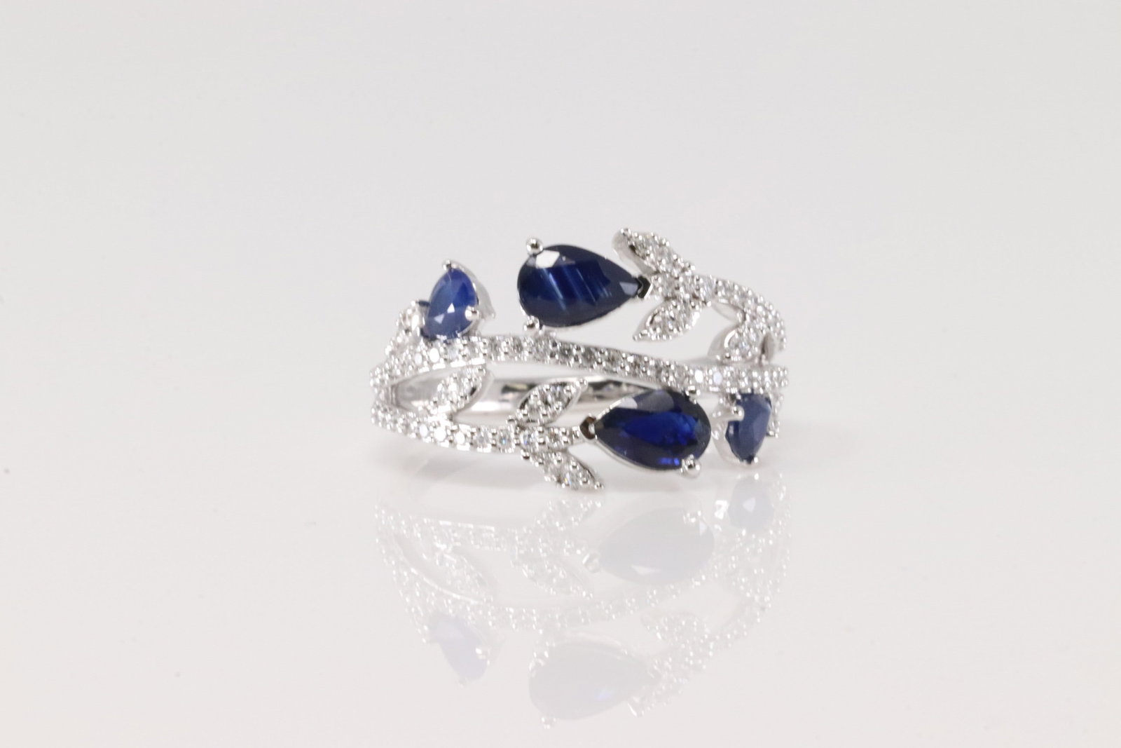 Sapphire & Diamond Ring 14Kt.: Ladies 14Kt White Gold Sapphire & Diamond Ring. This Ring has Pear-Shape sapphire with 65 Sparkling Diamonds. Diamonds weight: 0.27ctw. Sapphire weight: 1.51ctw. Ring size: 6.50.