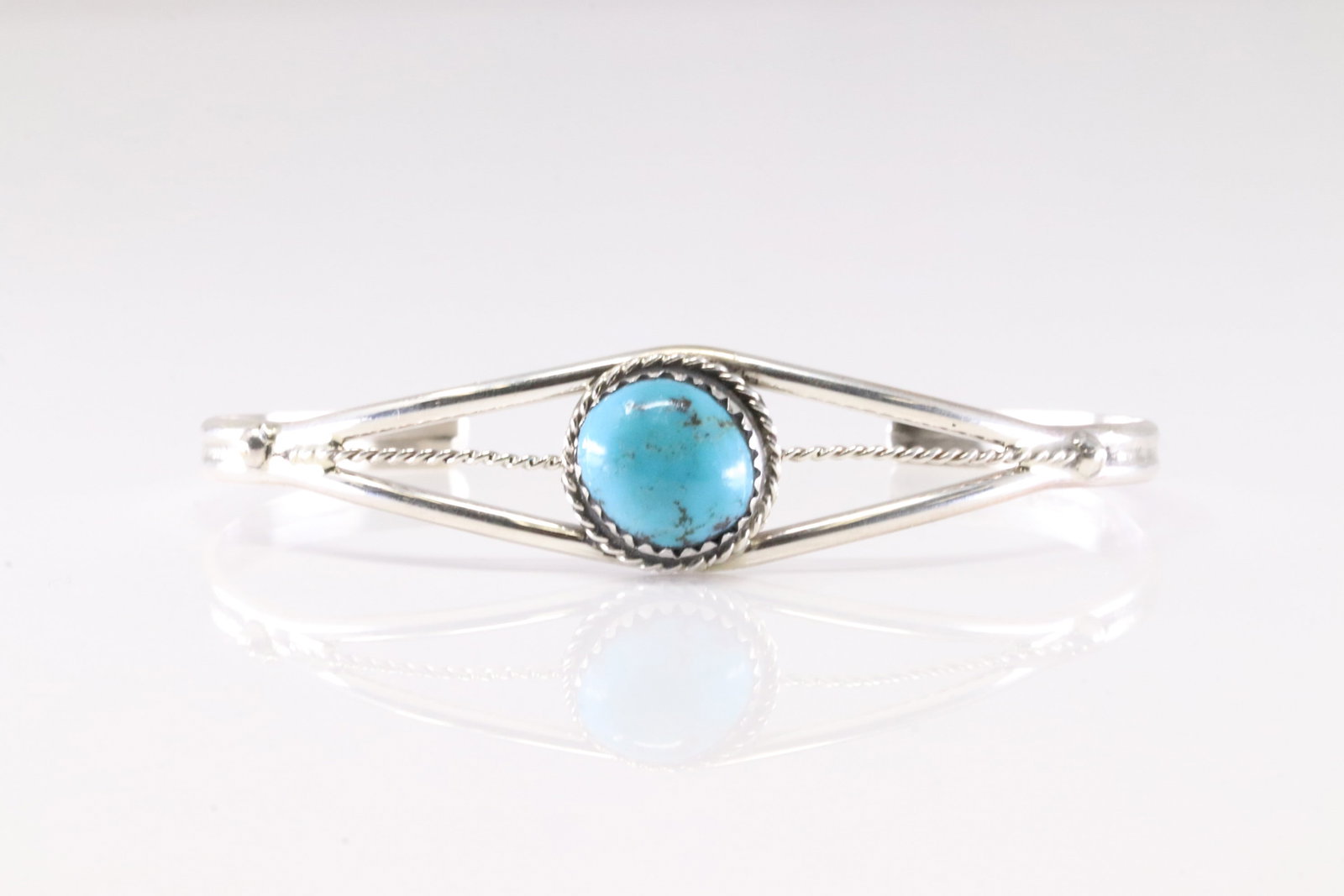 Native America Navajo Sterling Silver Turquoise Bracelet Cuff By Esther White.: This is a Native America Navajo Sterling Silver Turquoise Bracelet Cuff By Esther White. Stamp E.W.