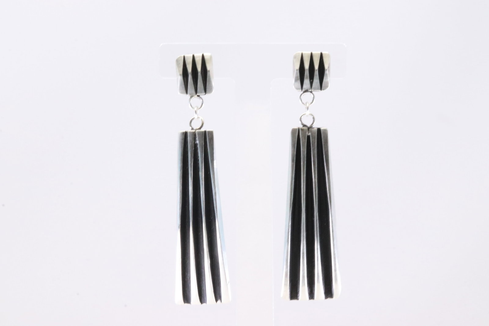 Native America Navajo Sterling Silver Solid Contemporary Geometric Post / Dangling Earring's By: This is a Native America Navajo Sterling Silver Solid Contemporary Geometric Post / Dangling Earring's By Leander Tahe.