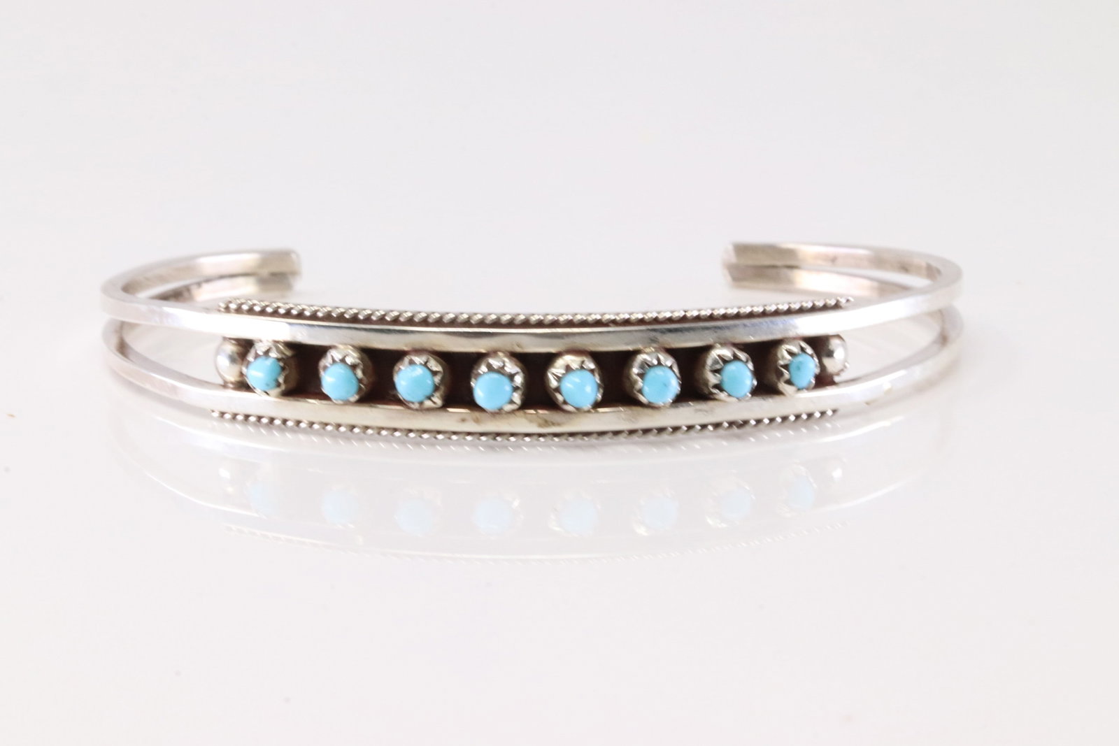 Native America Zuni Sterling Silver Turquoise Bracelet Cuff By AL.: This is a Native America Zuni Sterling Silver Turquoise Bracelet Cuff By AL. Stamp AL.