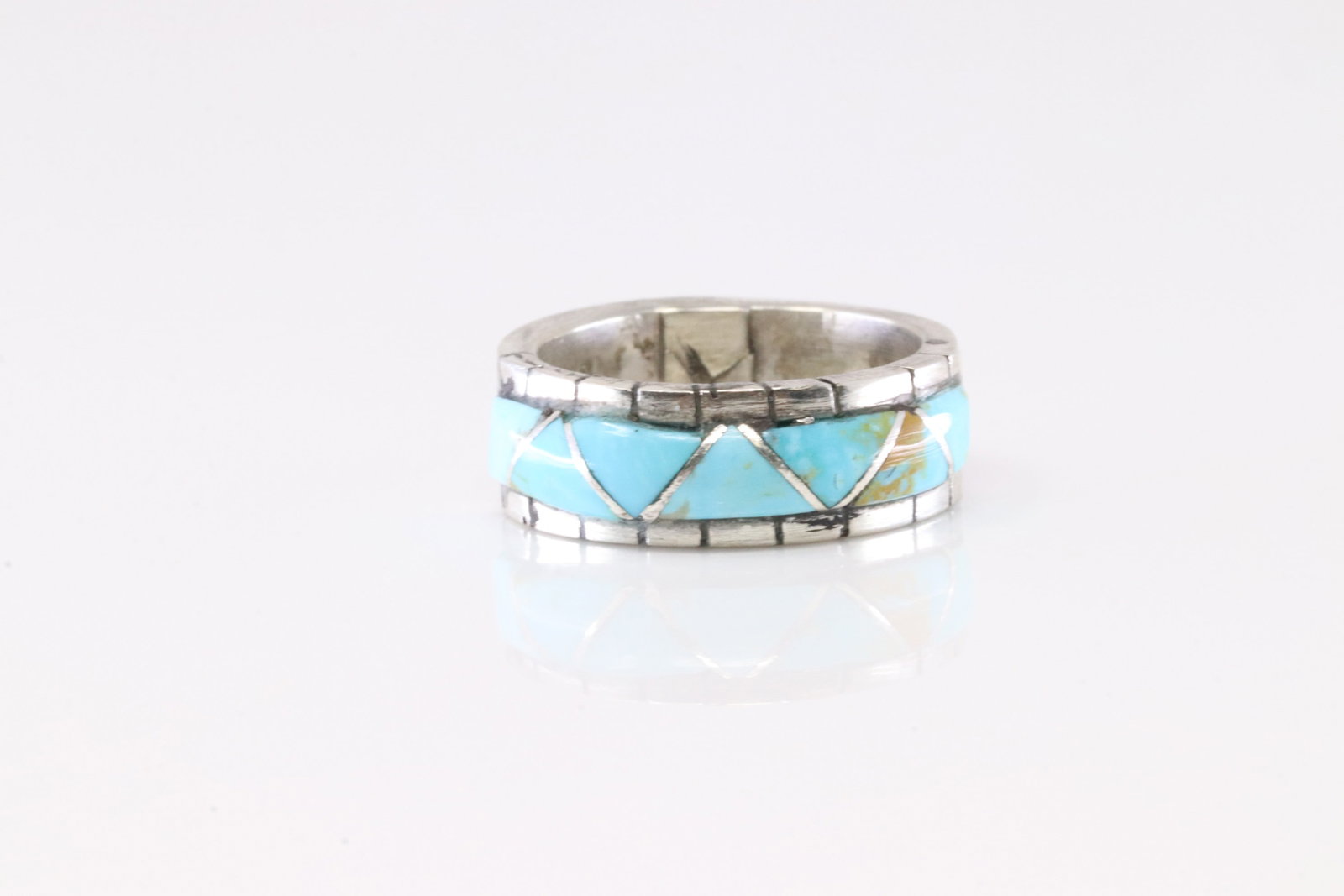 Native America Zuni Sterling Silver Turquoise Inlay Ring By Lucio.: This is a Native America Zuni Sterling Silver Turquoise Inlay Ring By Lucio. Ring size: 6.00.