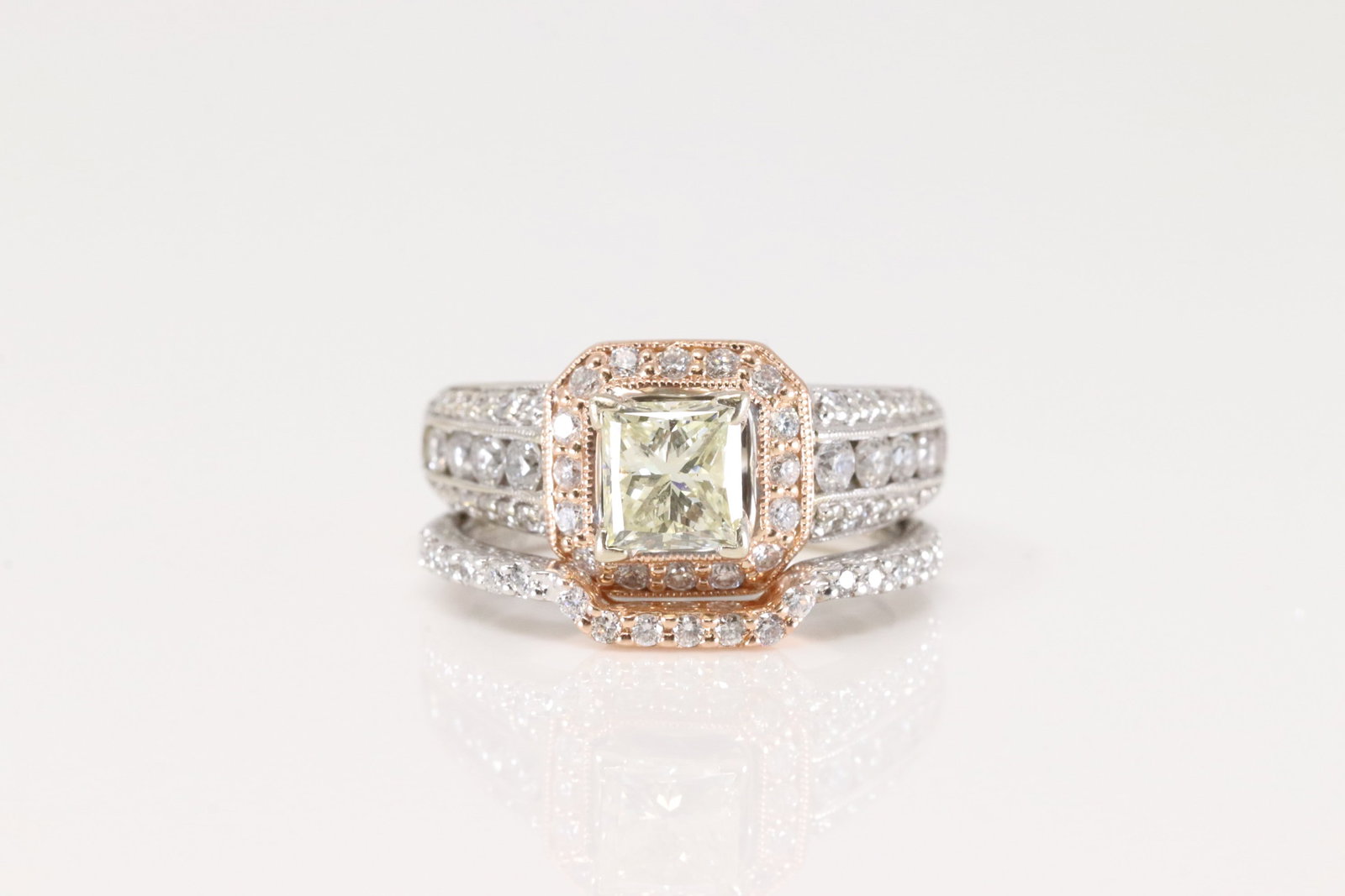 Diamond Bridal Set In 14Kt.: Ladies 14Kt White Gold Diamond Bridal Set. This Elegant Set has Engagement and Wedding Ring with 2 tone Gold and a total of 76 Brilliants Diamonds.Center stone approx 1.00 Diamonds Weight With Center
