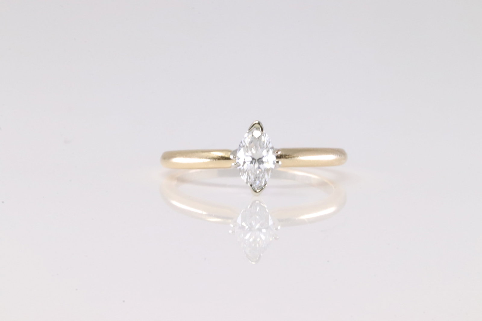 Diamond Ring 14Kt.: Ladies 14Kt Yellow Gold Diamond Ring. This Chraming Ring has Solitaire Marquise Diamond. Diamond Weight Approx:0.90 ctw . Total Weight 2.62 Grams. Ring Size: 8.00.