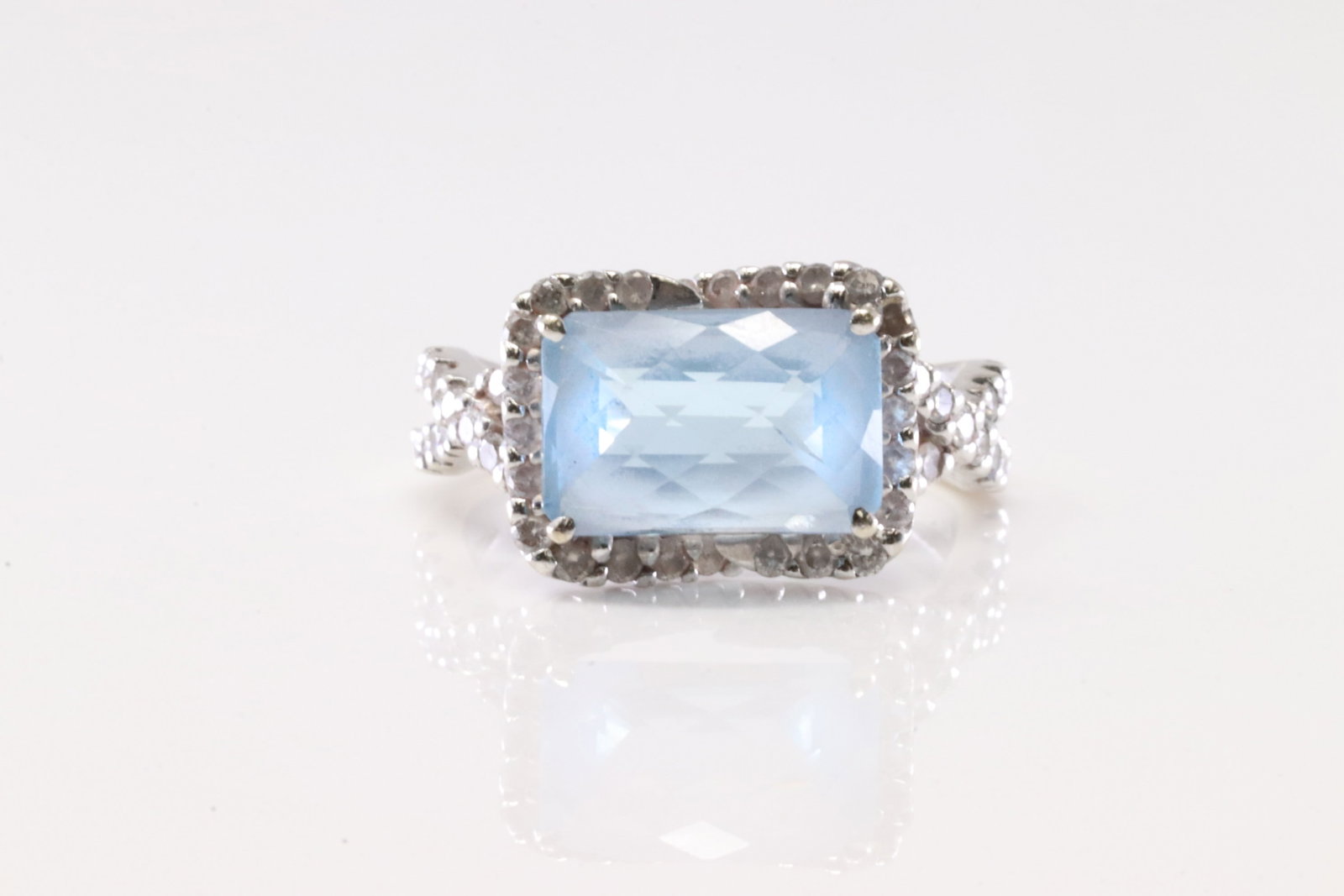 Aquamarine & Diamond Ring 14Kt.: Ladies 14Kt White Gold Aquamarine & Diamond Ring. This Charming Ring has A Squared Aquamarine Gemstone With 60 Round Sparkling Diamonds. Diamond Approx Weight: 0.65 ctw. Ring Size: 7.75. Total