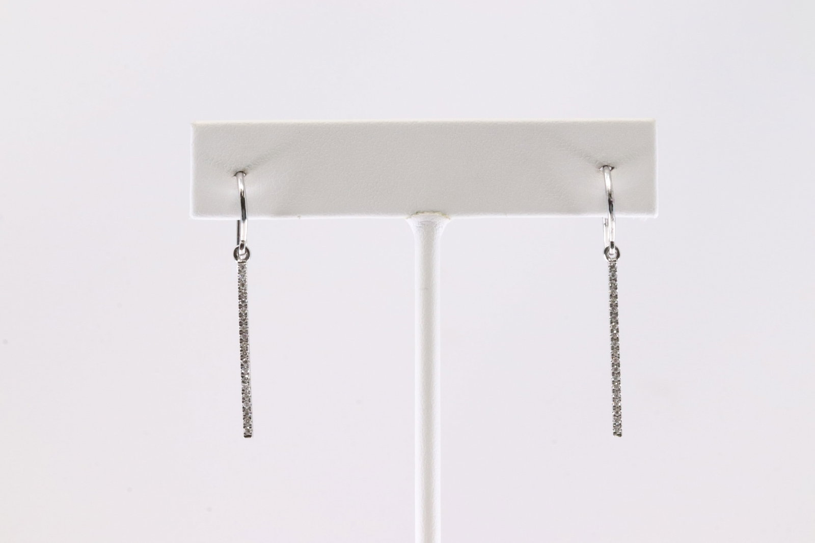 Diamond Hoop / Dangling Earring 14Kt.: Ladies 14Kt White Gold Diamond Hoop / Dangling Earring. This Charming Dangling Hoop Earring's has 40 Sparkling Diamonds. Diamonds weight: 0.20ctw.