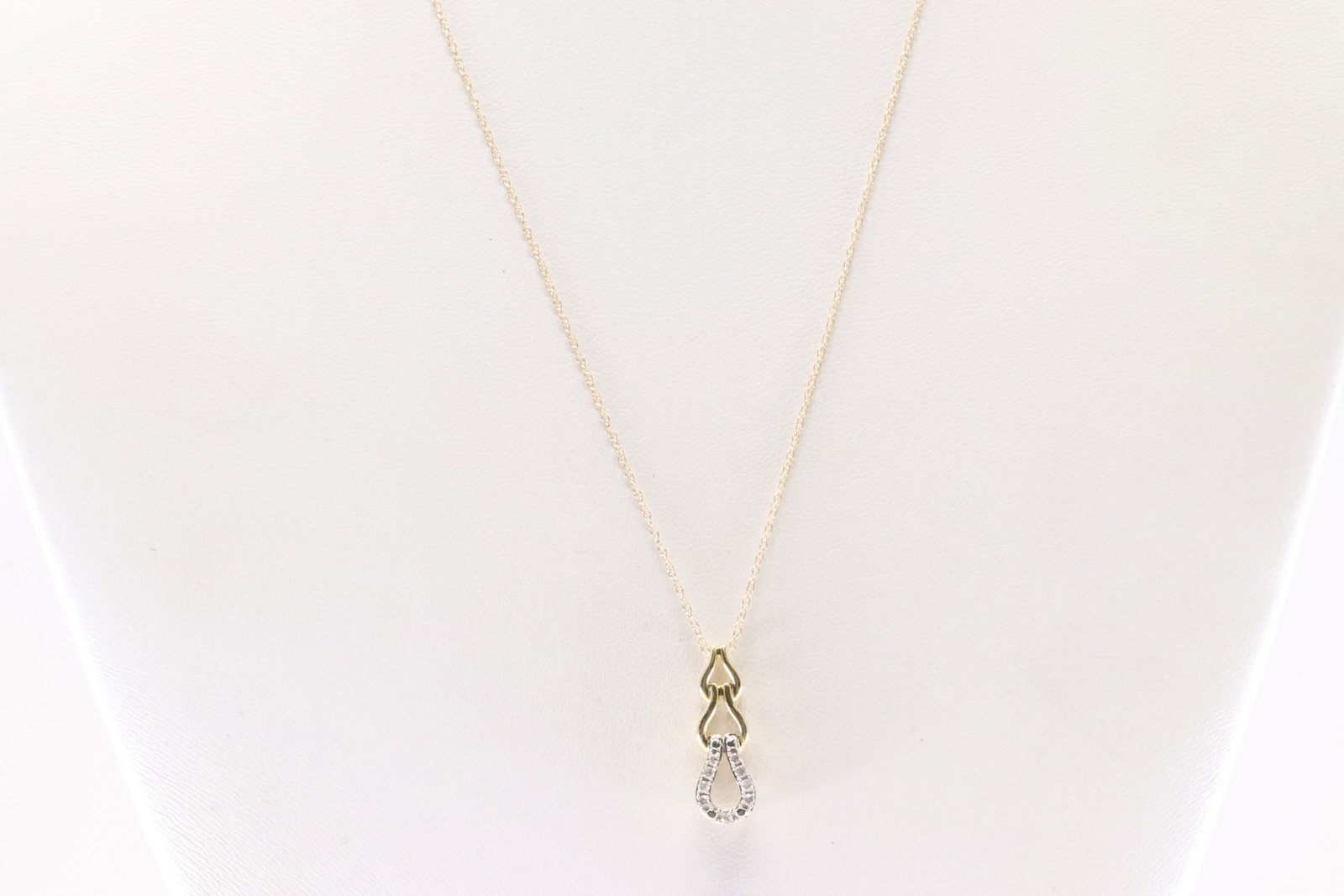 Diamond Pendant / Necklace 10Kt.: 10Kt Yellow Gold Diamond Pendant / Necklace. This Elegant Pendant has Sparkling Diamonds with A 10K Necklace. Diamonds weight: 0.10ctw. Necklace length: 18.00'