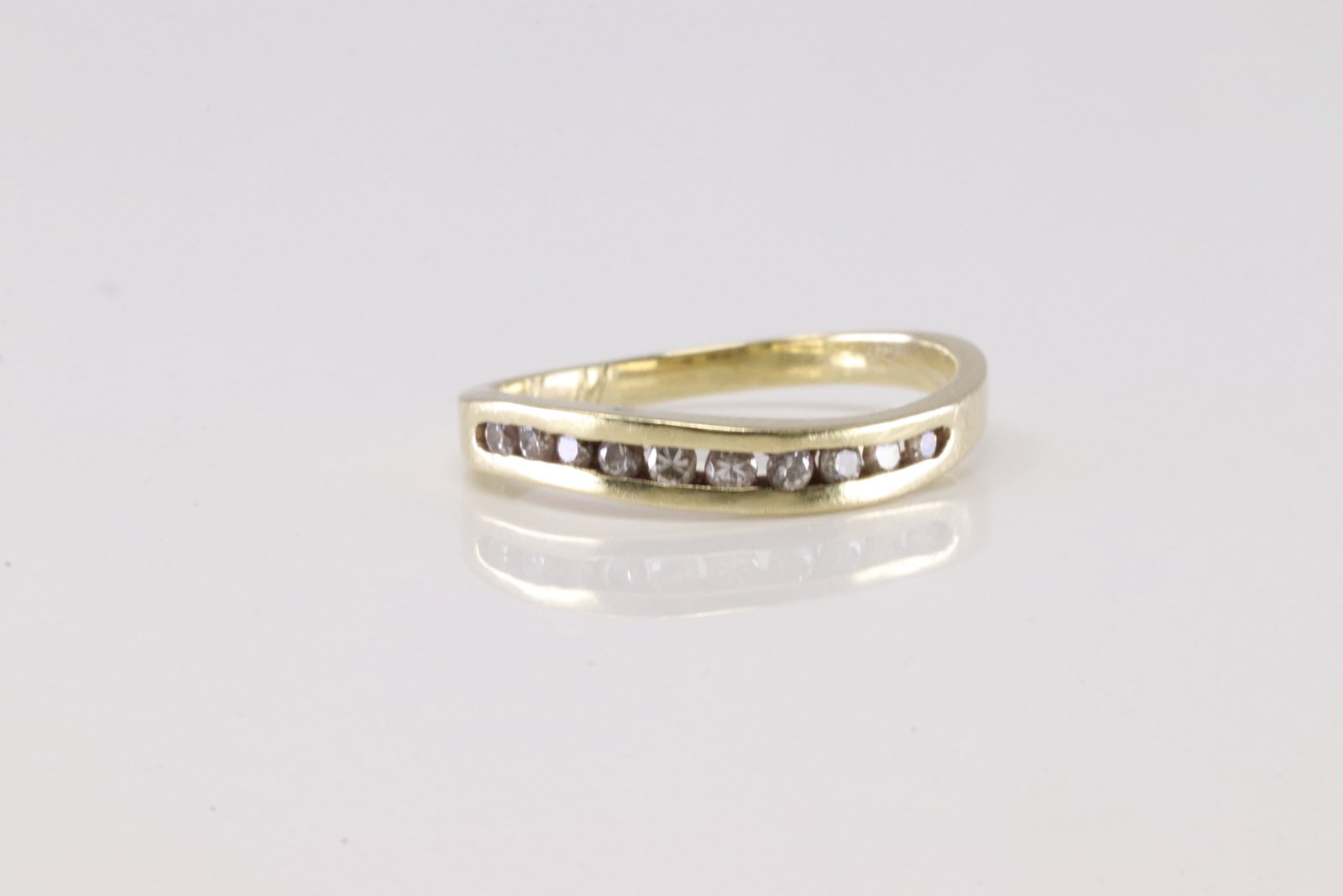 Diamond Ring 14Kt.: Ladies 14Kt Yellow Gold Diamond Ring. This Elegant Ring has 10 Round Sparkling Diamonds. Diamond Approx Weight: 0.38ctw. Ring Size: 6.25. Total Weight: 2.00 Grams.