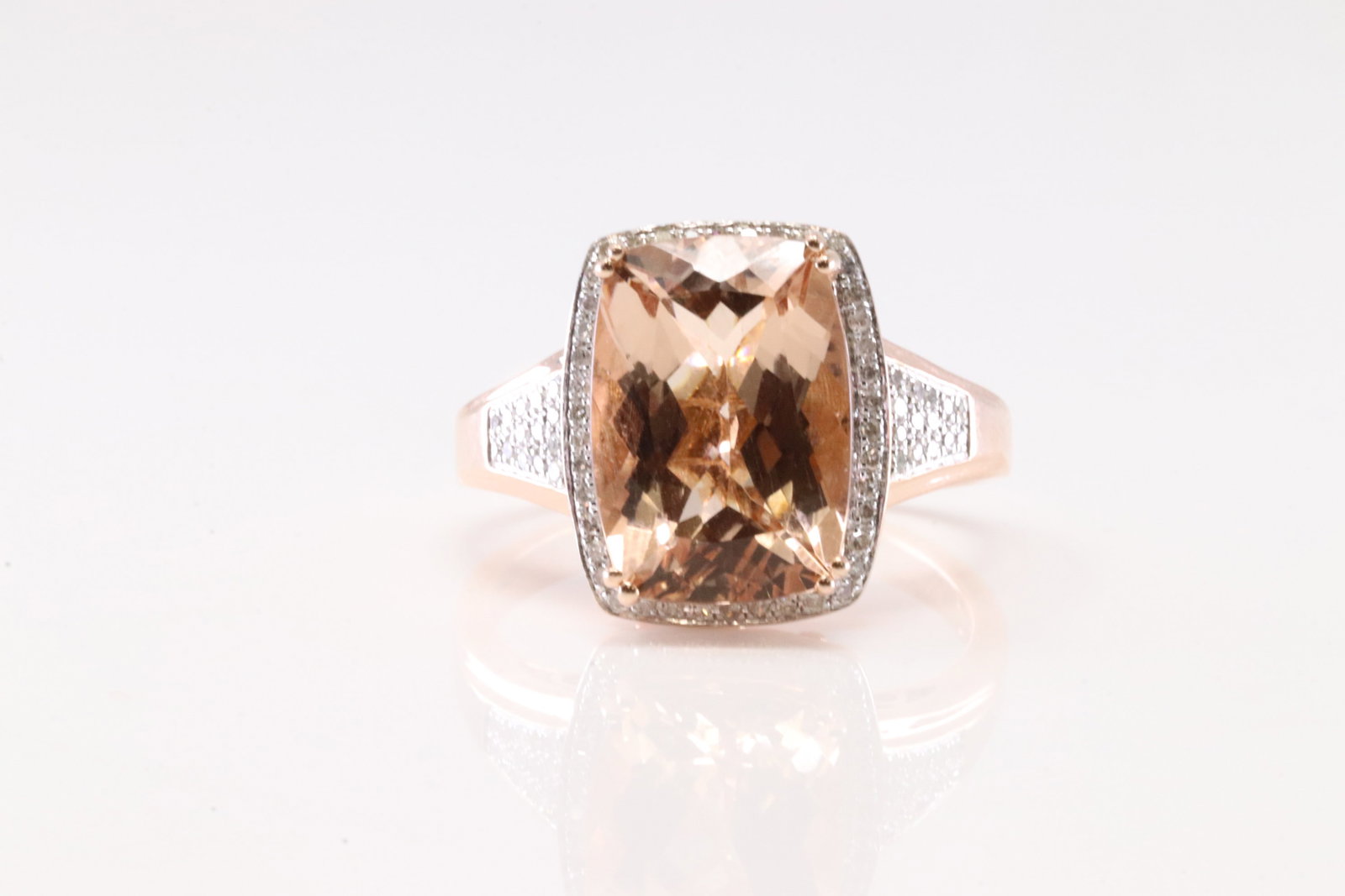 Morganite & Diamond Ring 14Kt.: Ladies 14Kt Rose Gold Morganite & Diamond Ring. This Ring has Gorgeous Morganite Gemstone With 70 Round Sparkling Diamonds. Ring Size: 9.00. Total Weight: 6.50 Grams.