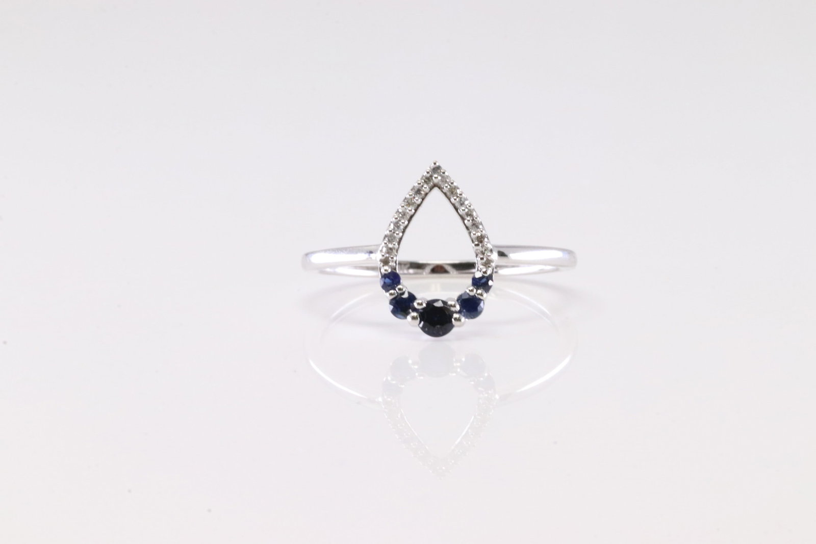 Sapphire & Diamond Ring 14Kt.: Ladies 14Kt White Gold Diamond & Sapphire Ring. This Ring has Pear-Shaped with Sapphires and Sparkling Diamonds. Diamonds weight: 0.29ctw. Ring size: 6.50.