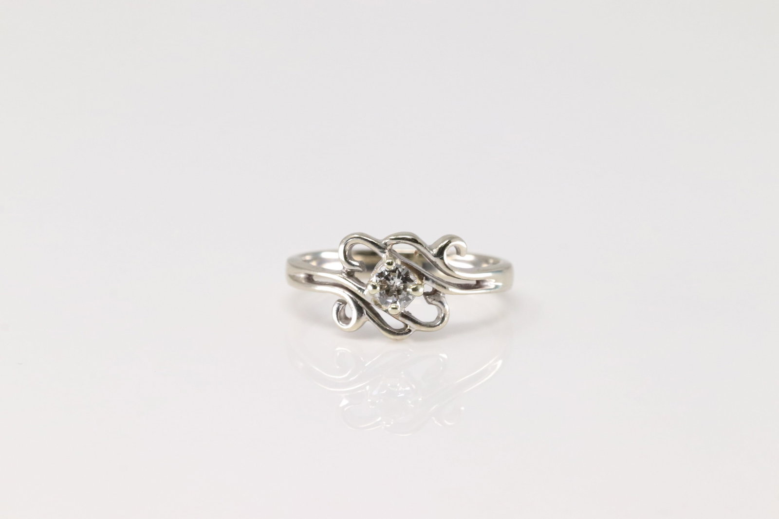 Diamond Ring 14Kt.: Ladies 14Kt White Gold Diamond Ring. This Charming Ring has Solitaire Brilliant Diamonds. Diamond weight approx: 0.25ctw. Ring size: 6.00. Total weight: 2.60 Grams.