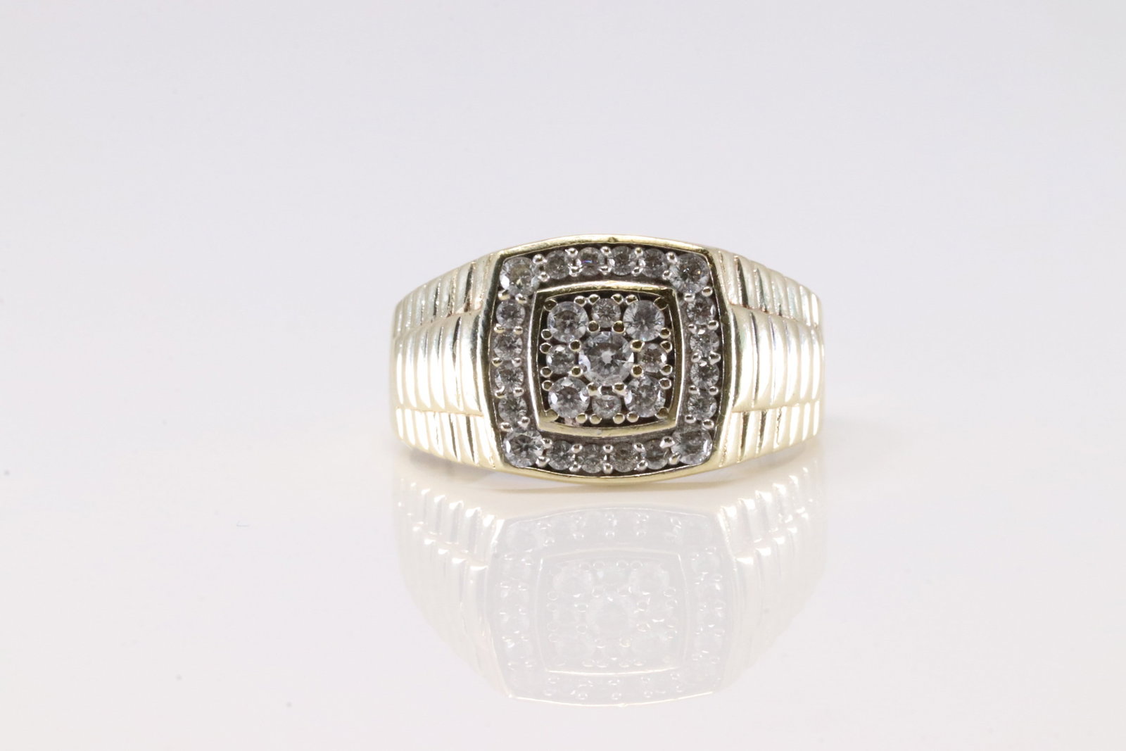 Elegant Diamond Ring 10Kt.: 10Kt Yellow Gold Diamond Ring. This Elegant Diamond Ring has Watch Design with 29 Brilliants Diamonds. Diamonds weight: approx: 0.35 ctw Ring size: 12.25. Total weight: 4.94 Grams.