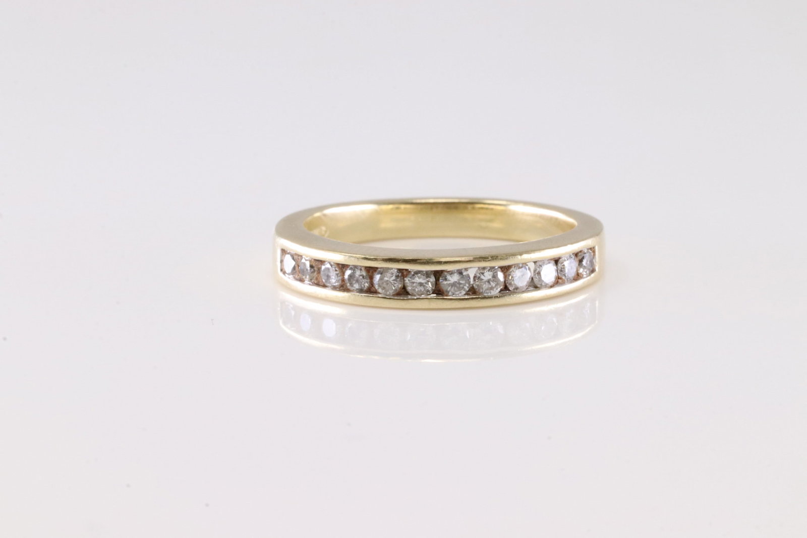 Diamond Ring 14Kt.: Ladies 14Kt Yellow Gold Diamond Ring. This Gorgeous Ring has 12 Round Sparkling Diamonds. Diamond Approx Weight: 0.50ctw. Ring Size: 7.00. Total Weight: 3.85 Grams.