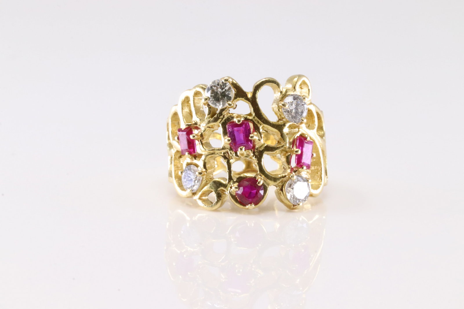 Ruby & Diamond Ring 14Kt.: Ladies 14Kt Yellow Gold Ruby & Diamond Ring. This Ring has Gorgeous Design With 4 Ruby Gemstones & 4 Round Sparkling Diamonds. Diamond Approx Weight: 1.00ctw. Ring Size: 5.75. Total Weight: 8.40
