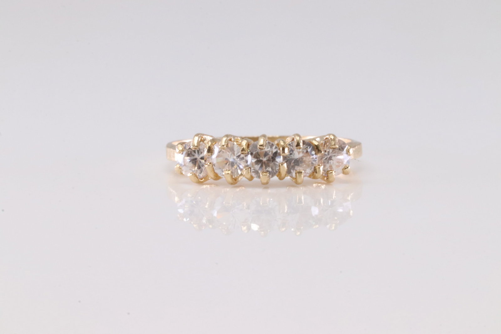 Diamond Ring 14Kt.: Ladies 14Kt Yellow Gold Diamond Ring. This Elegant Ring has 5 Round Sparkling Diamonds. Diamond Approx Weight: 1.00ctw. Ring Size: 7.00. Total Weight: