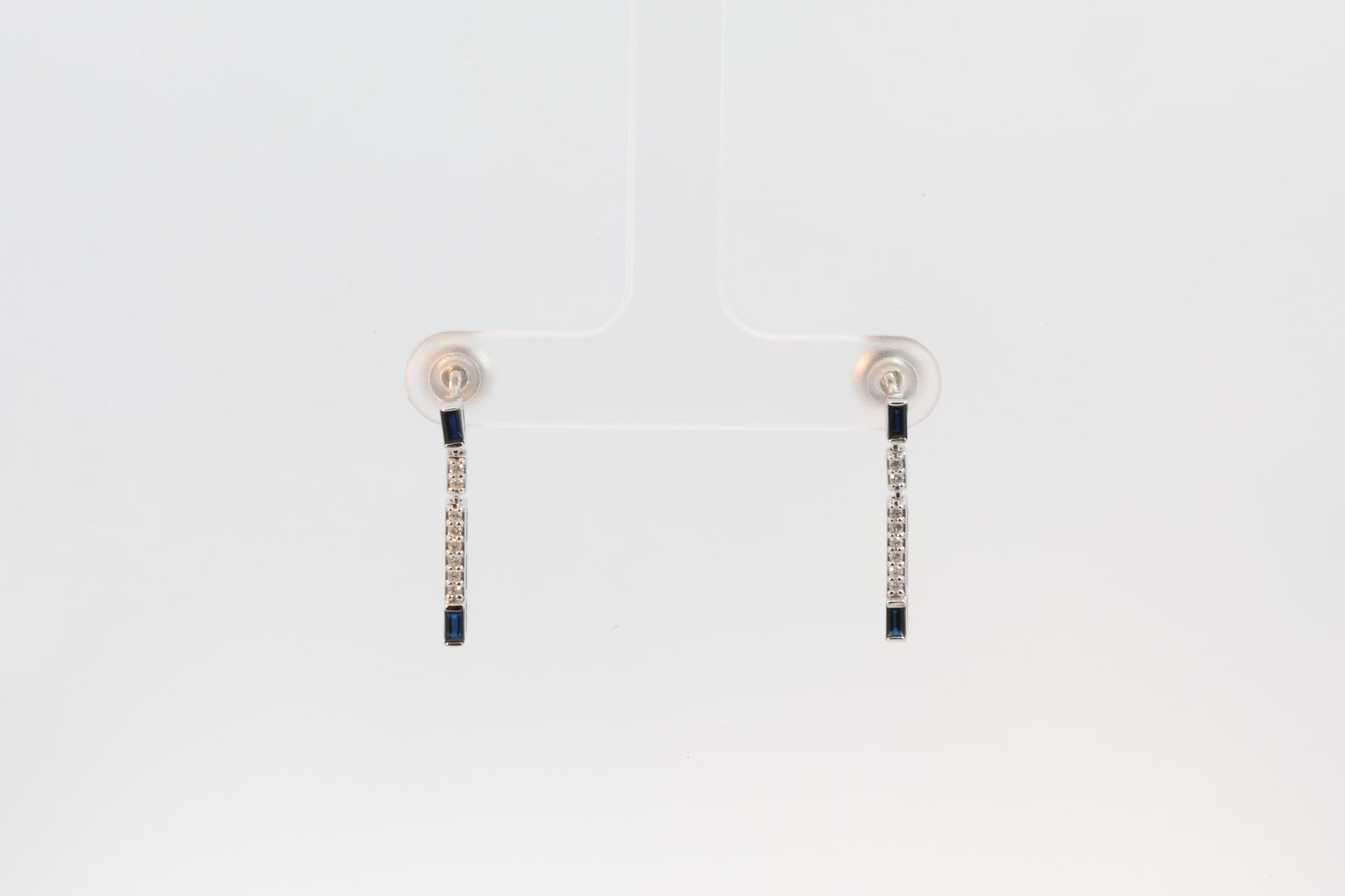 Sapphire & Diamond Stud Earring 14Kt.: Ladies 14Kt White Gold Sapphire & Diamond Stud Earring. Earring's has 4 Cut Sapphire with 16 round Diamonds. Diamonds weight: 0.10ct. Sapphire's weight: 0.31ct.