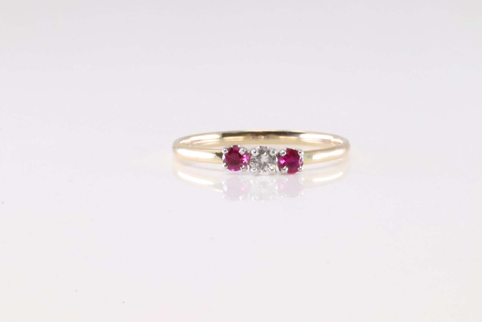 Ruby & Diamond Ring 14Kt.: Ladies 14Kt Yellow Gold Ruby & Diamond Ring. This Charming Ring has 2 Pink Ruby with Sparkling Diamond. Ring size: 7.75.