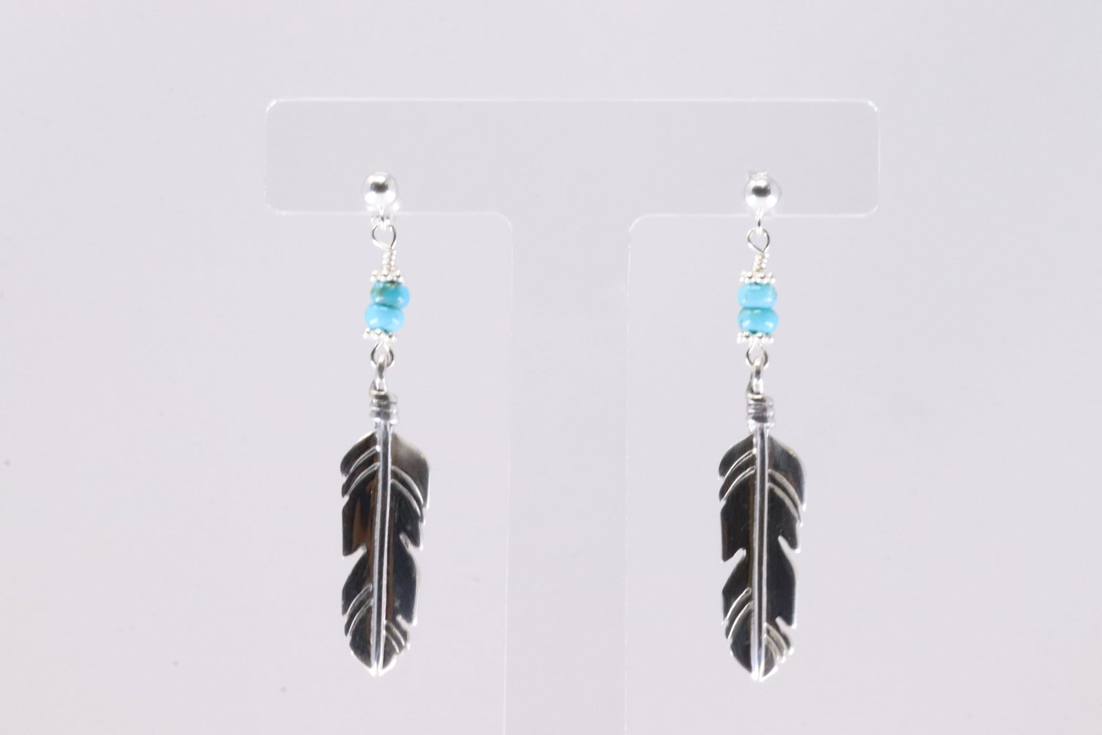 America Sterling Silver Turquoise Feather Post / Dangling Earring's.: This is a America Sterling Silver Turquoise Feather Post / Dangling Earring's.