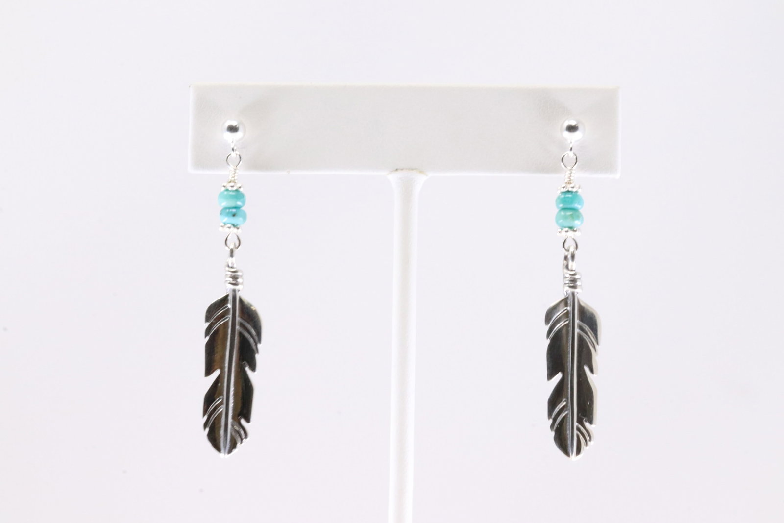 America Sterling Silver Turquoise Feather Post / Dangling Earring's.: This is a America Sterling Silver Turquoise Feather Post / Dangling Earring's.
