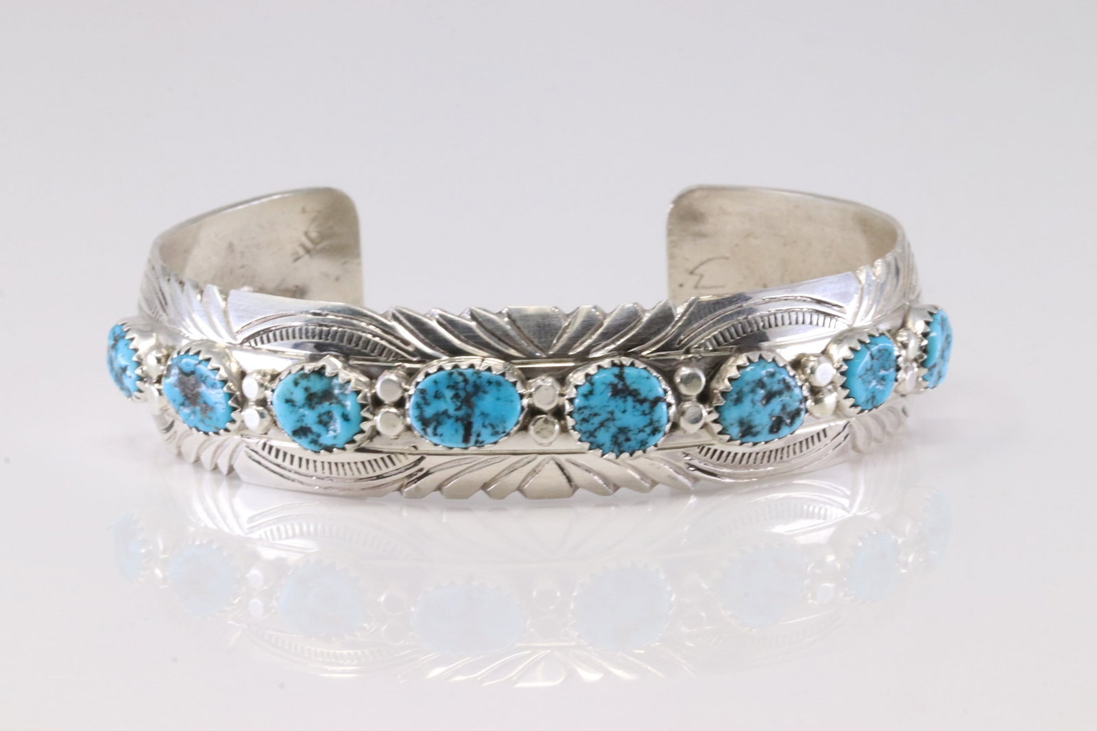 Native America Navajo Sterling Silver Turquoise Bracelet Cuff By S.: This is a Native America Navajo Sterling Silver Turquoise Bracelet Cuff By S. Stamp S.