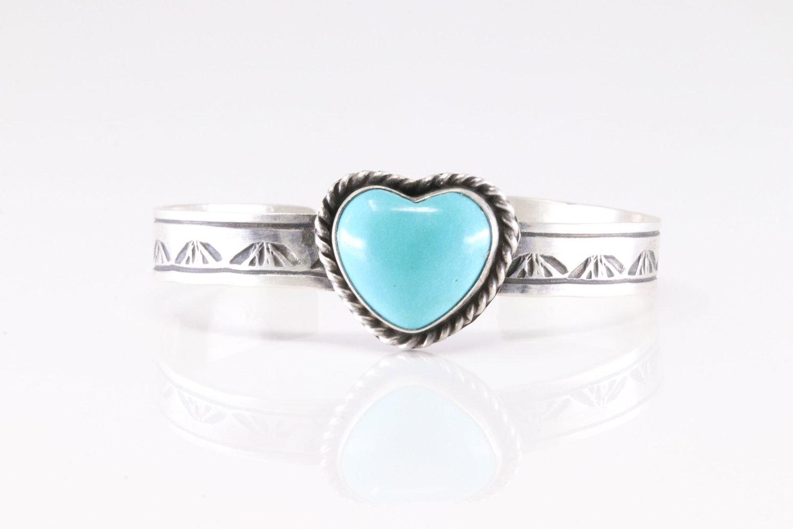 Native America Navajo Sterling Silver Turquoise Heart Bracelet Cuff By R.E.: This is a Native America Navajo Sterling Silver Turquoise Heart Bracelet Cuff By R.E. Stamp RE.