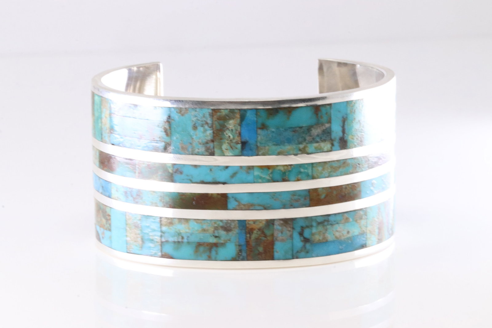 Native America Navajo Sterling Silver Kingman Turquoise Inlay Bracelet Cuff By L.H.: This is a Native America Navajo Sterling Silver Kingman Turquoise Inlay Bracelet Cuff By L.H.