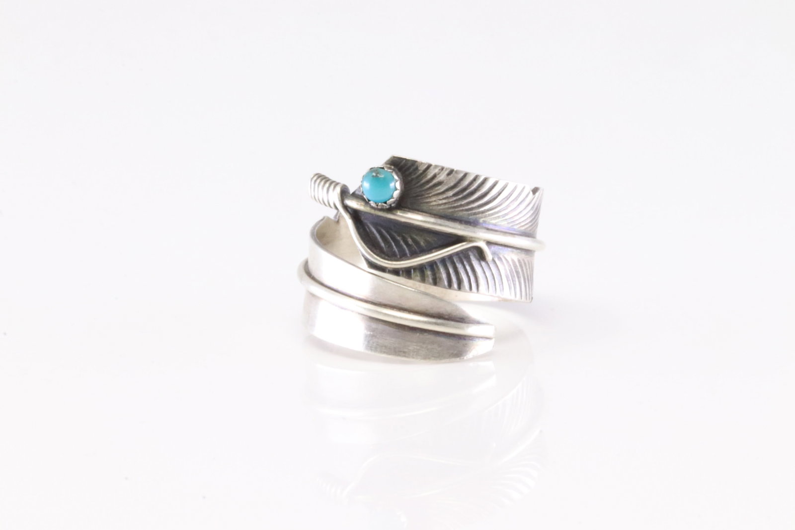 Native America Navajo Sterling Silver Turquoise Feather Ring By C.C.: This is a Native America Navajo Sterling Silver Turquoise Feather Ring By C.C. Stamp CC. Ring size: 7.25.