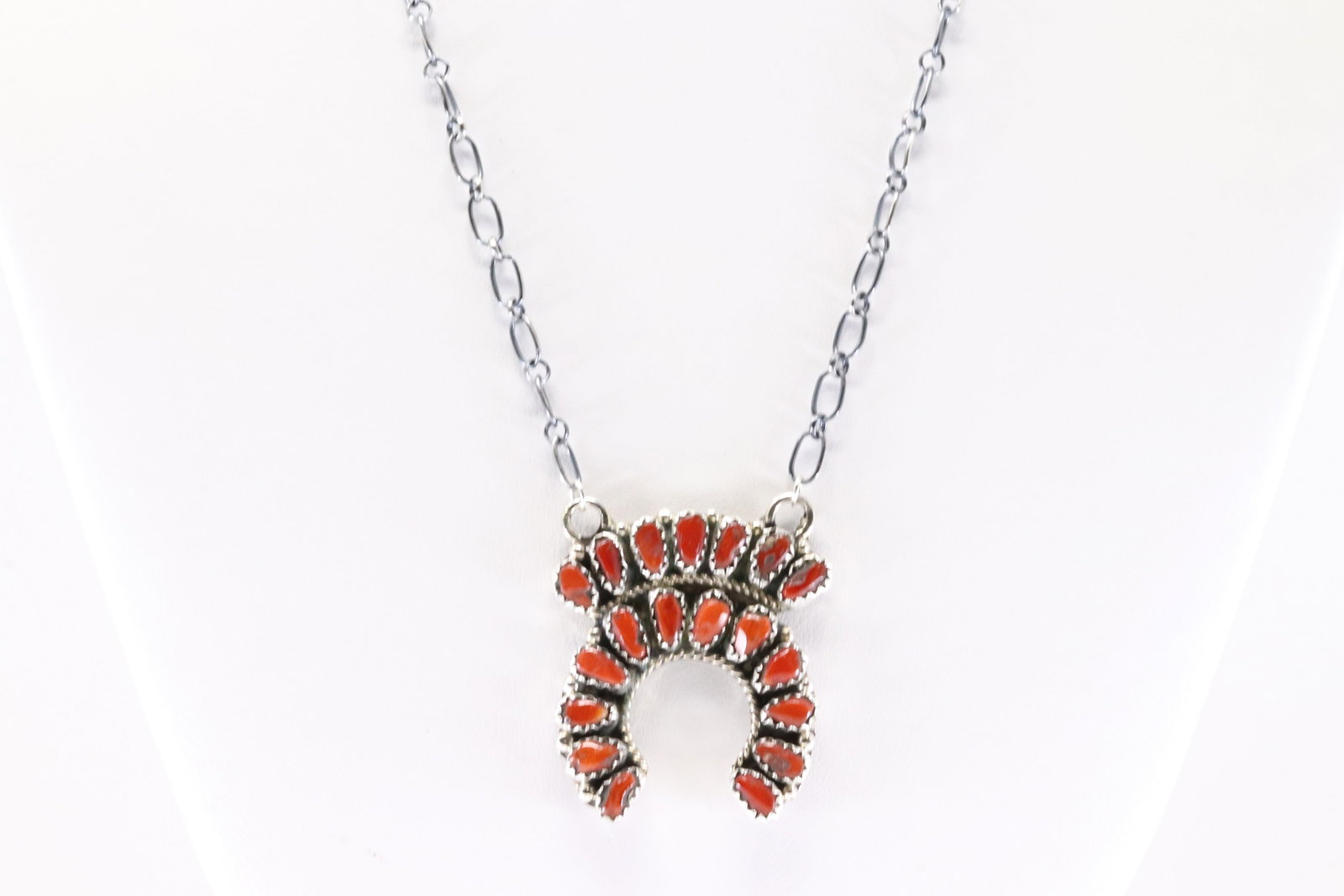 Native America Navajo Sterling Silver Coral Necklace By Justina Wilson.: This is a Native America Navajo Sterling Silver Coral Necklace By Justina Wilson. Stamp JW. Necklace length: 18.00"