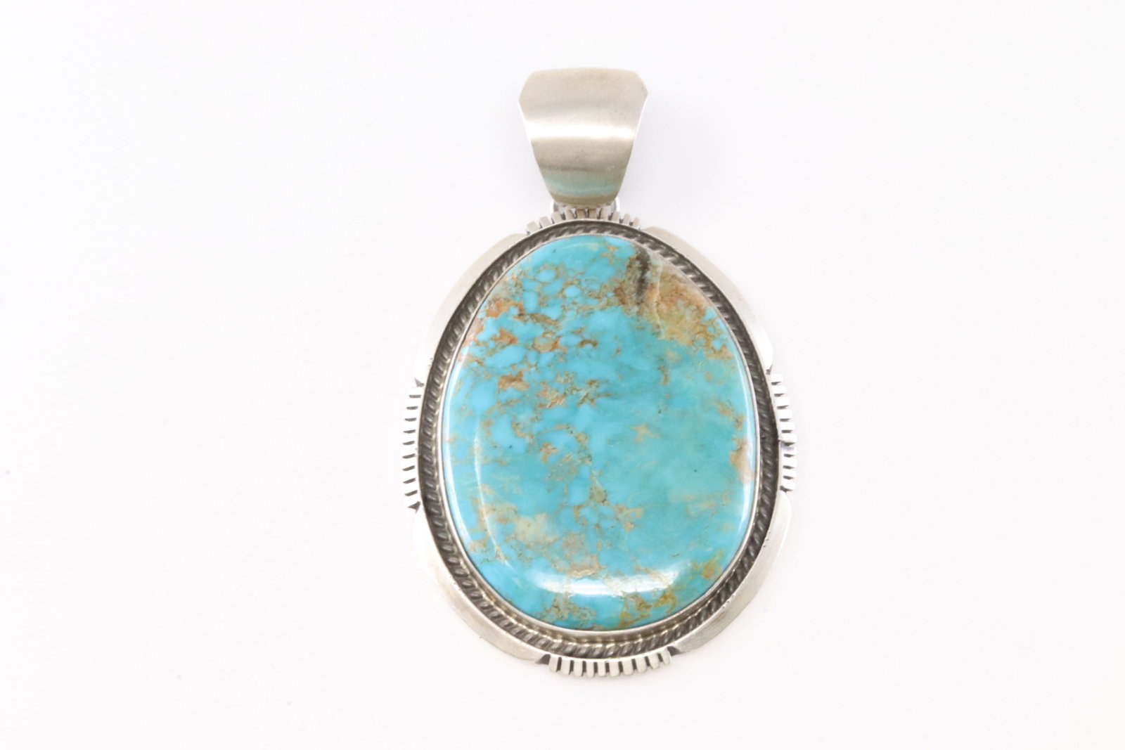 Native America Navajo Sterling Silver Kingman Turquoise Pendant By Alfred Martinez.: This is a Native America Navajo Sterling Silver Kingman Turquoise Pendant By Alfred Martinez.